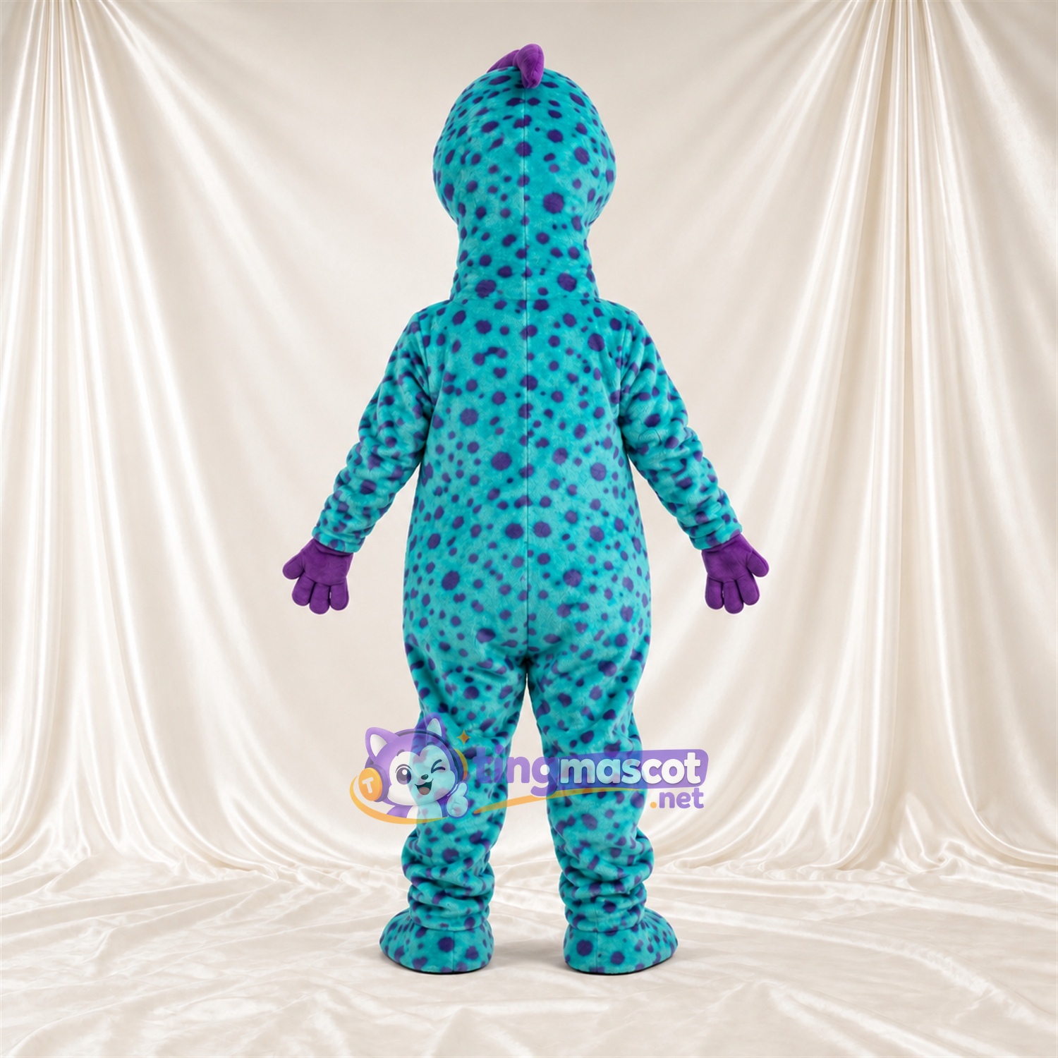 Costume de mascotte Dinosaure – bleu canard – Ventre (violet) Costume de mascotte Dinosaure – bleu canard – Ventre (violet)