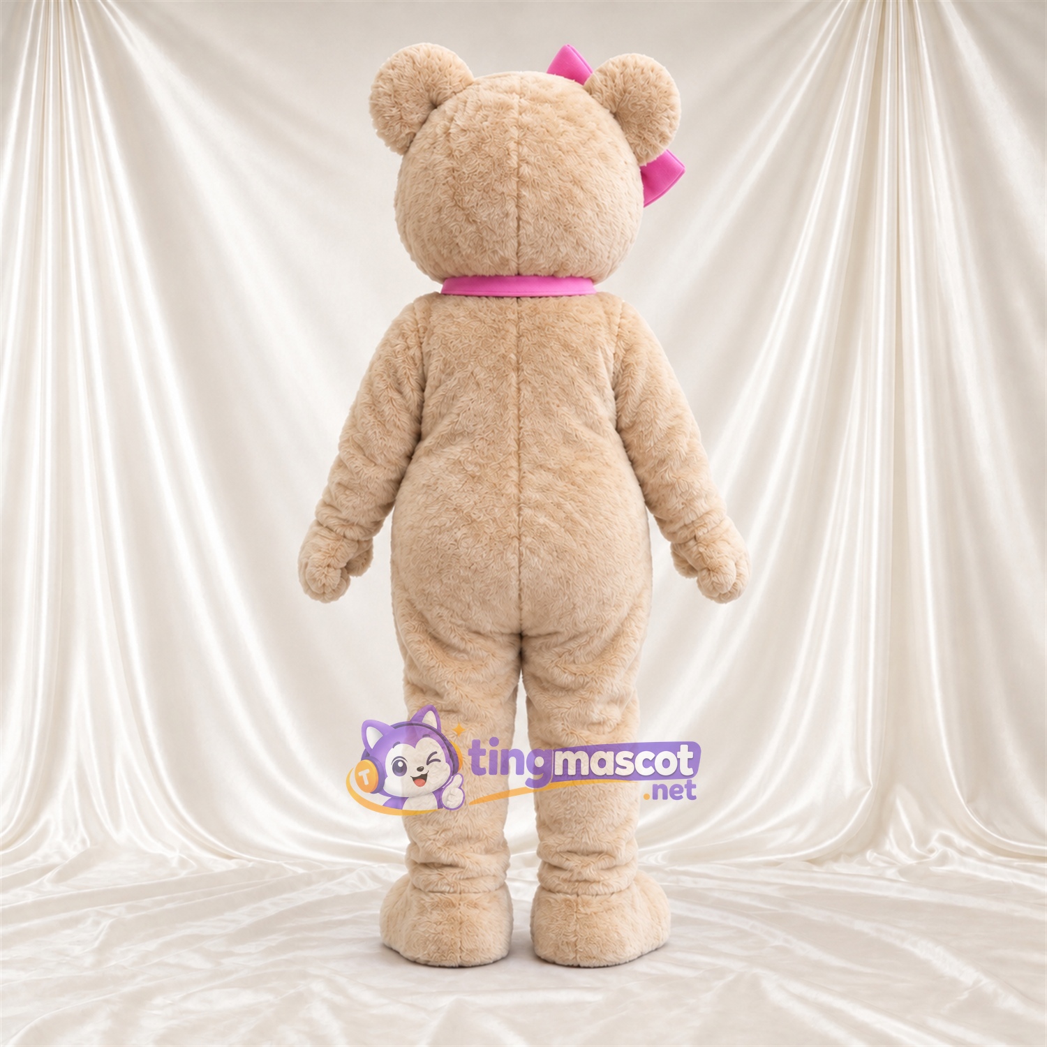 Maskottchenkostüm Bär – hellbraun – Schleifen (rosa) Maskottchenkostüm Bär – hellbraun – Schleifen (rosa)
