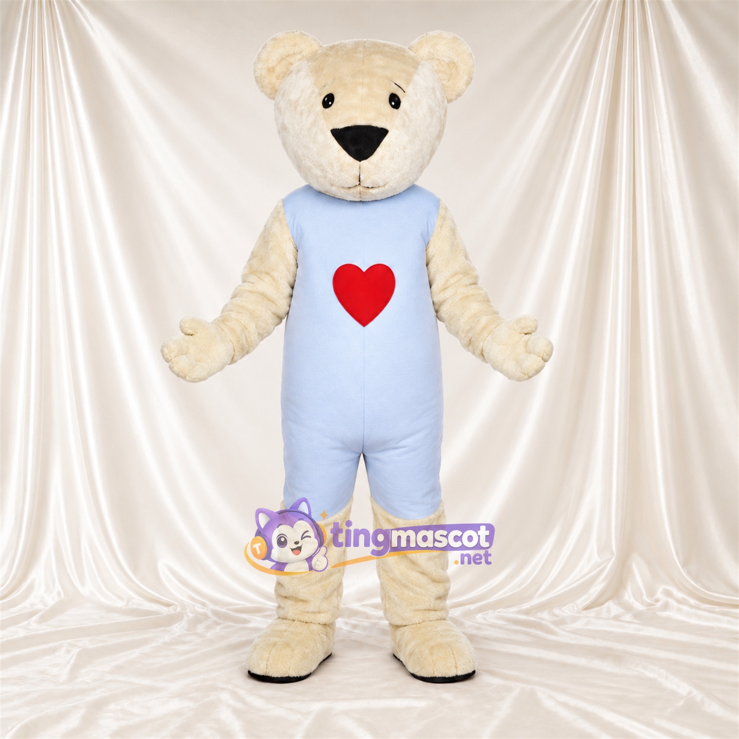 Maskottchenkostüm Bär – creme – Latzhose (blau) Maskottchenkostüm Bär – creme – Latzhose (blau)