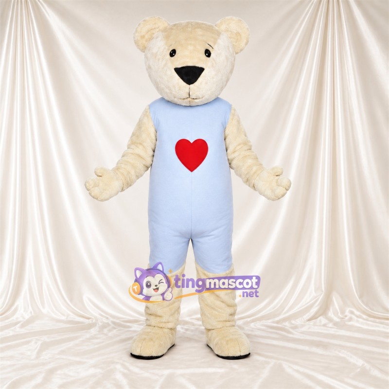 Maskottchenkostüm Bär – creme – Latzhose (blau) Maskottchenkostüm Bär – creme – Latzhose (blau)
