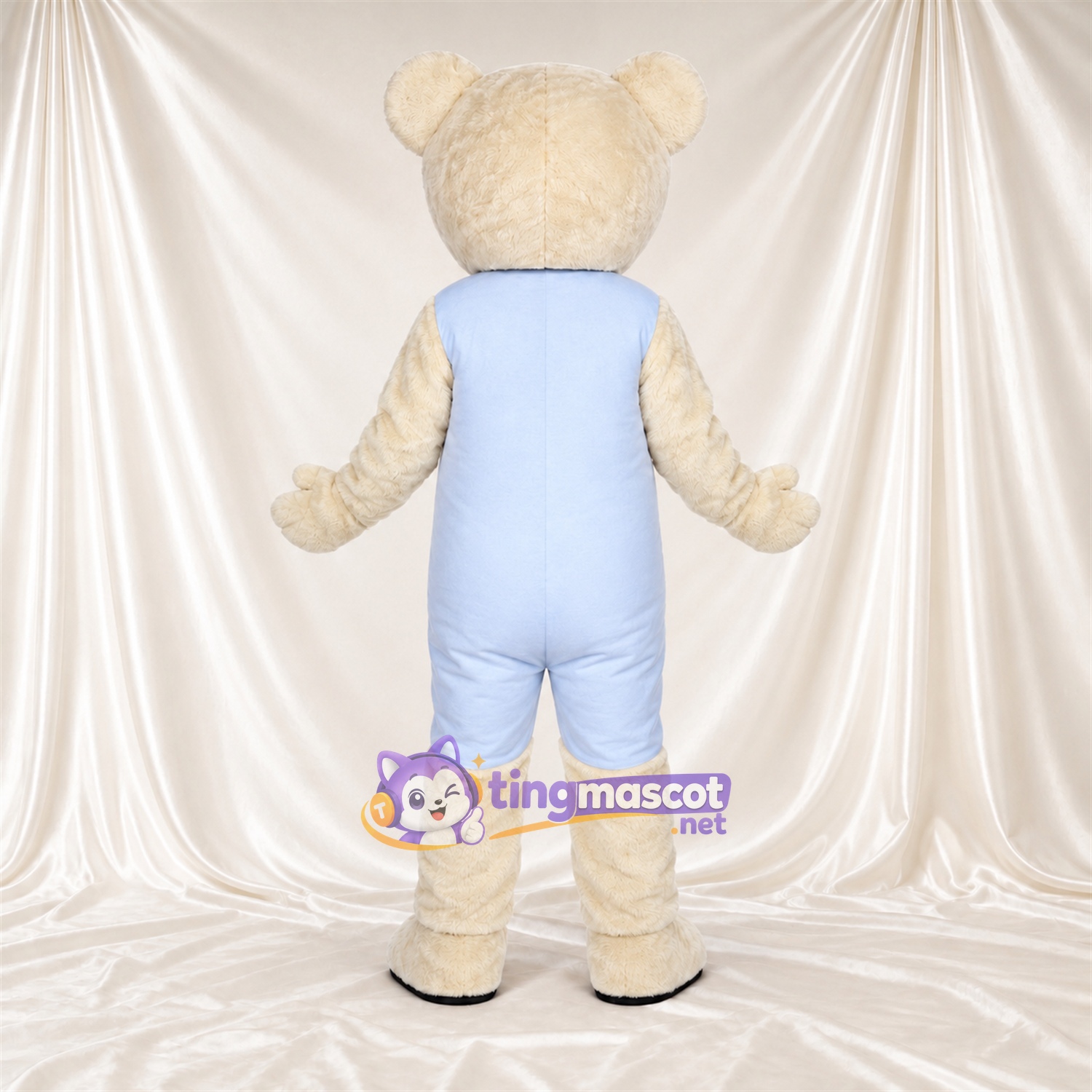 Maskottchenkostüm Bär – creme – Latzhose (blau) Maskottchenkostüm Bär – creme – Latzhose (blau)