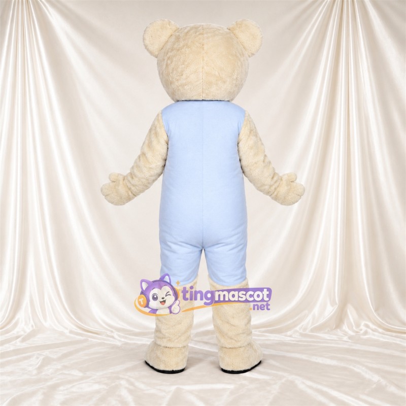 Maskottchenkostüm Bär – creme – Latzhose (blau) Maskottchenkostüm Bär – creme – Latzhose (blau)