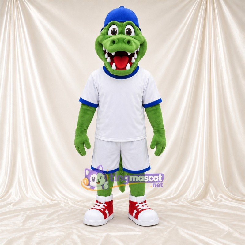 Costume de mascotte Crocodile – vert – Tenue de sport (blanc); Casquette (bleu) Costume de mascotte Crocodile – vert – Tenue de sport (blanc); Casquette (bleu)