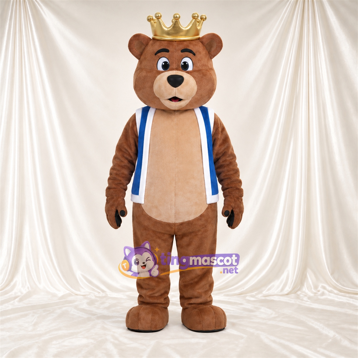 Maskottchenkostüm Bär – braun – Krone; Weste (blau) Maskottchenkostüm Bär – braun – Krone; Weste (blau)