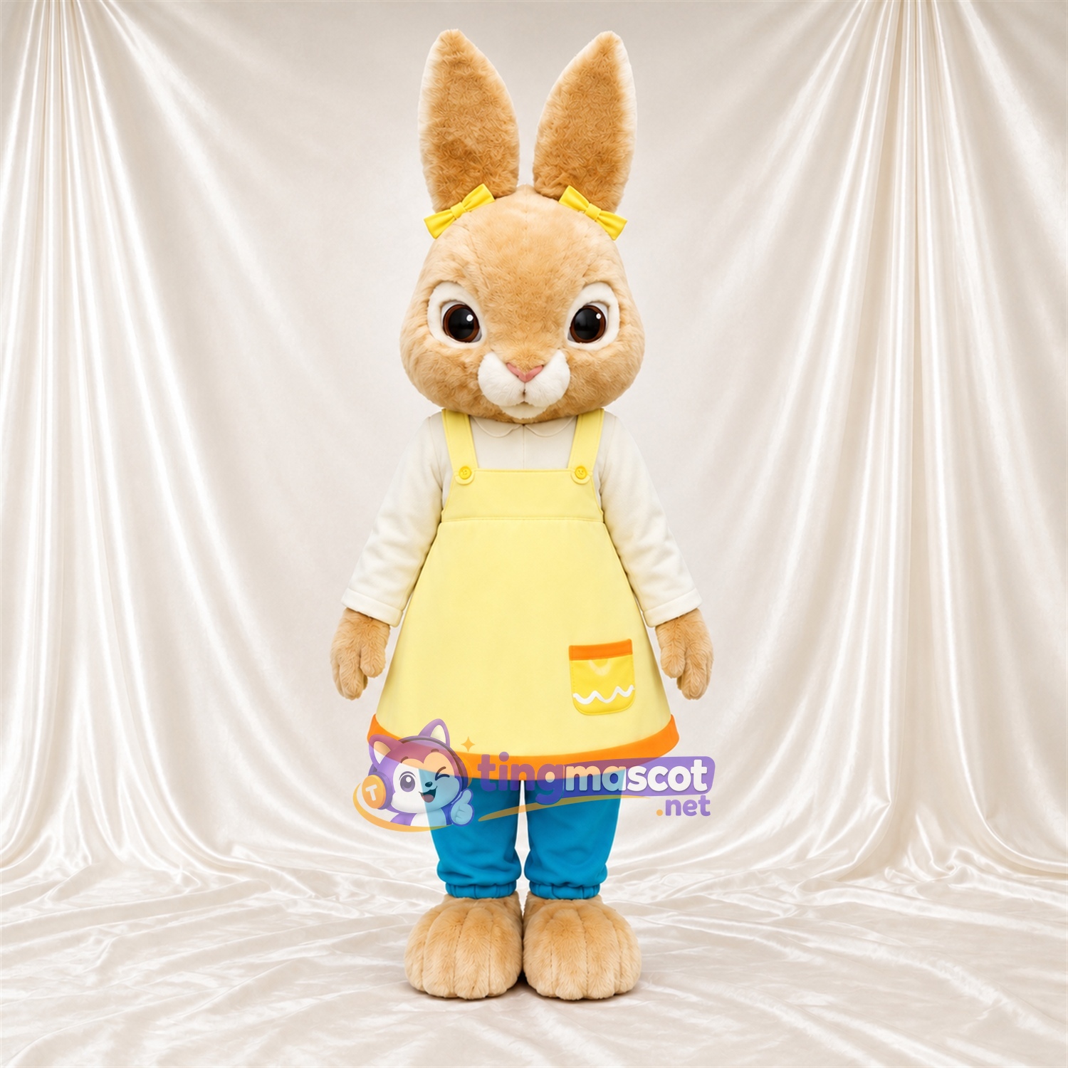 Costume de mascotte Lapin – brun clair – Tablier (jaune) Costume de mascotte Lapin – brun clair – Tablier (jaune)
