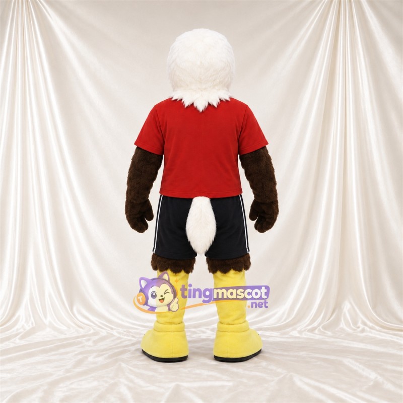 Maskottchenkostüm Adler – braun – Hemd (rot); Shorts (schwarz) Maskottchenkostüm Adler – braun – Hemd (rot); Shorts (schwarz)