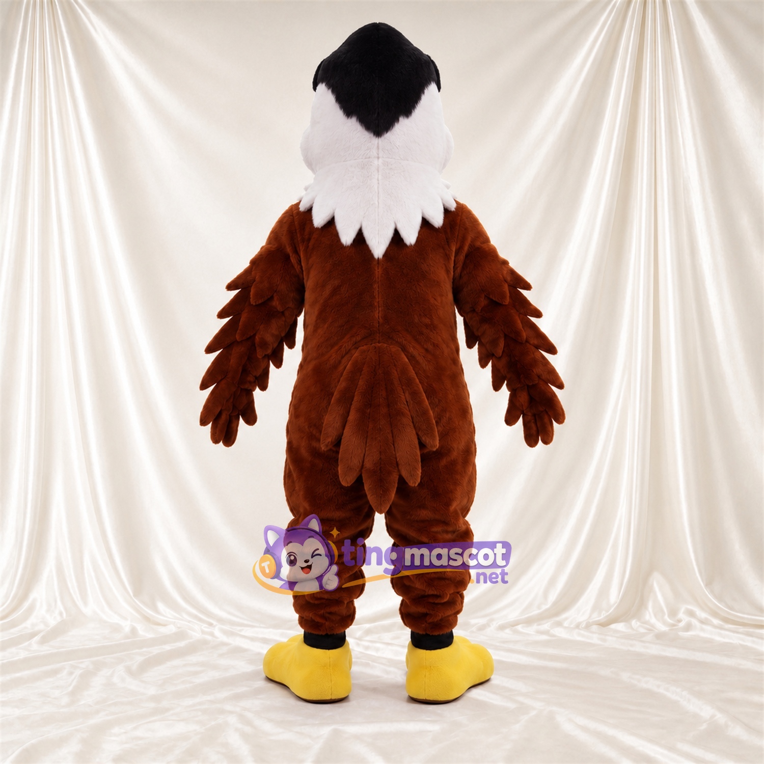 Costume de mascotte Aigle – marron – Couronne (noir); Tête (blanc) Costume de mascotte Aigle – marron – Couronne (noir); Tête (blanc)