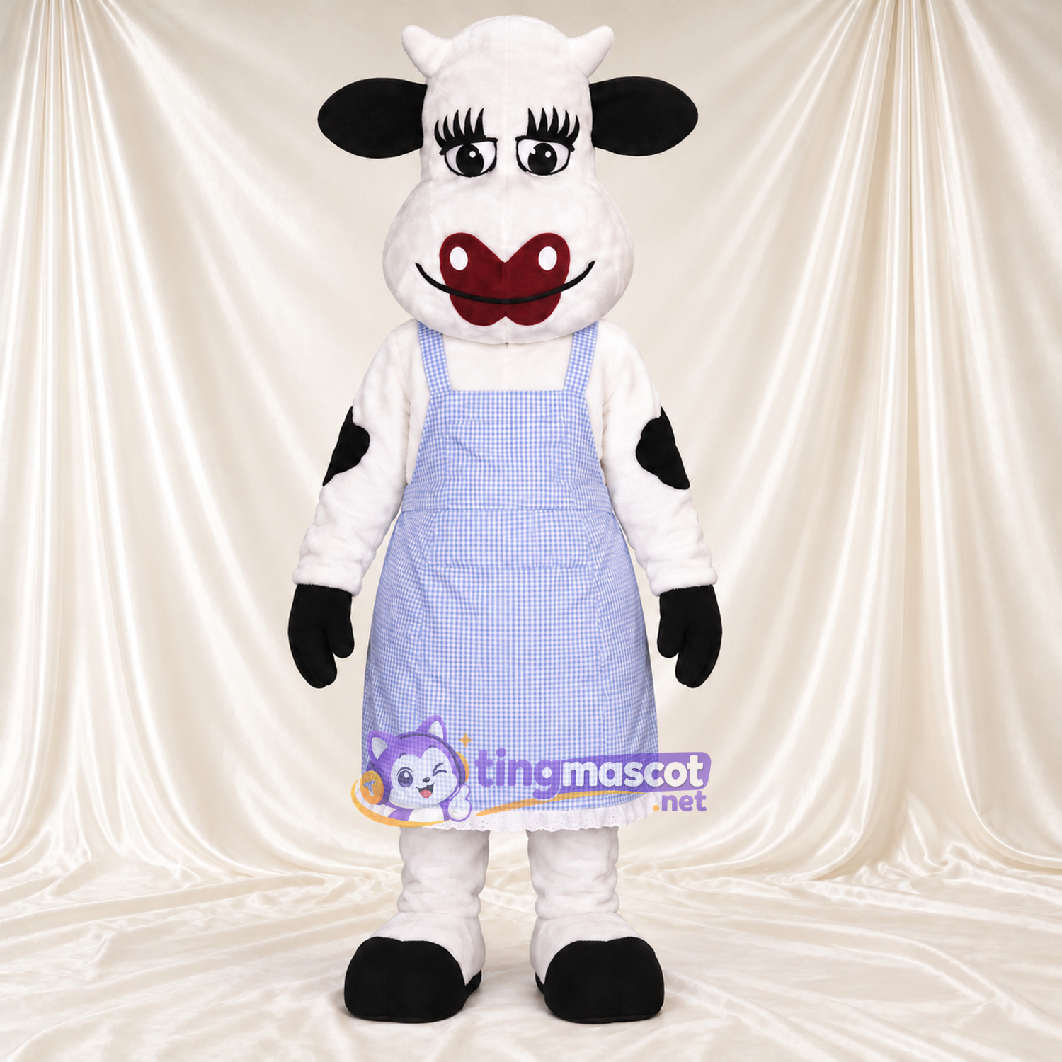 Maskottchenkostüm Kuh – schwarz / weiß – Schürze (violett) Maskottchenkostüm Kuh – schwarz / weiß – Schürze (violett)
