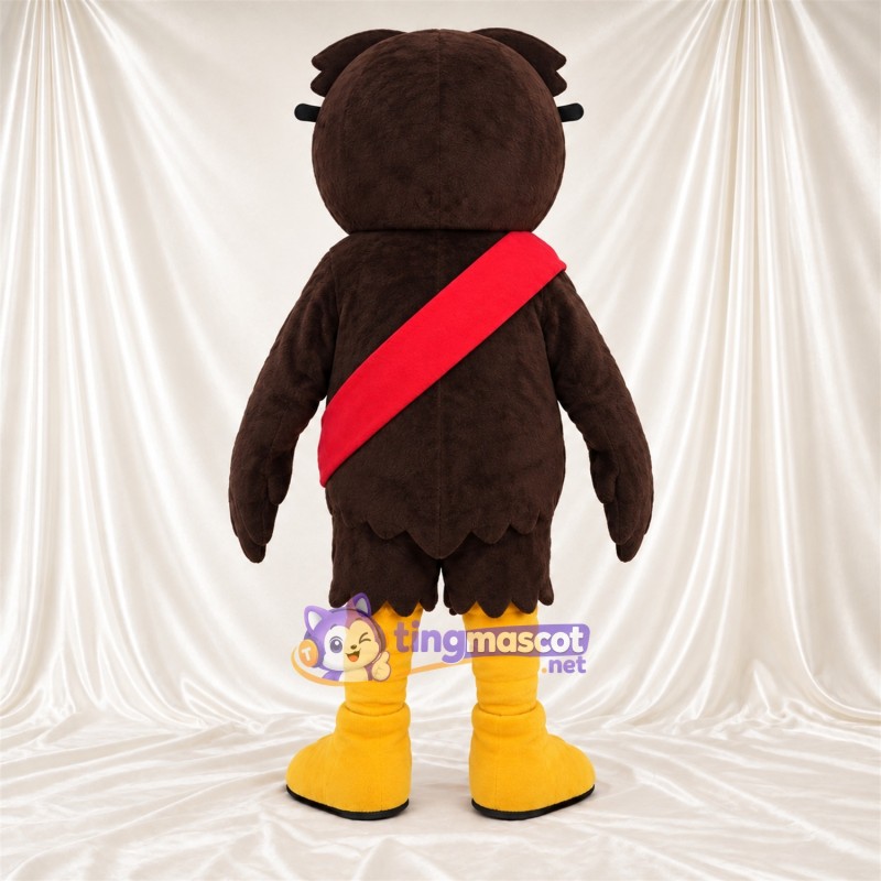 Costume de mascotte Hibou – marron – Écharpe en bandoulière (rouge) Costume de mascotte Hibou – marron – Écharpe en bandoulière (rouge)