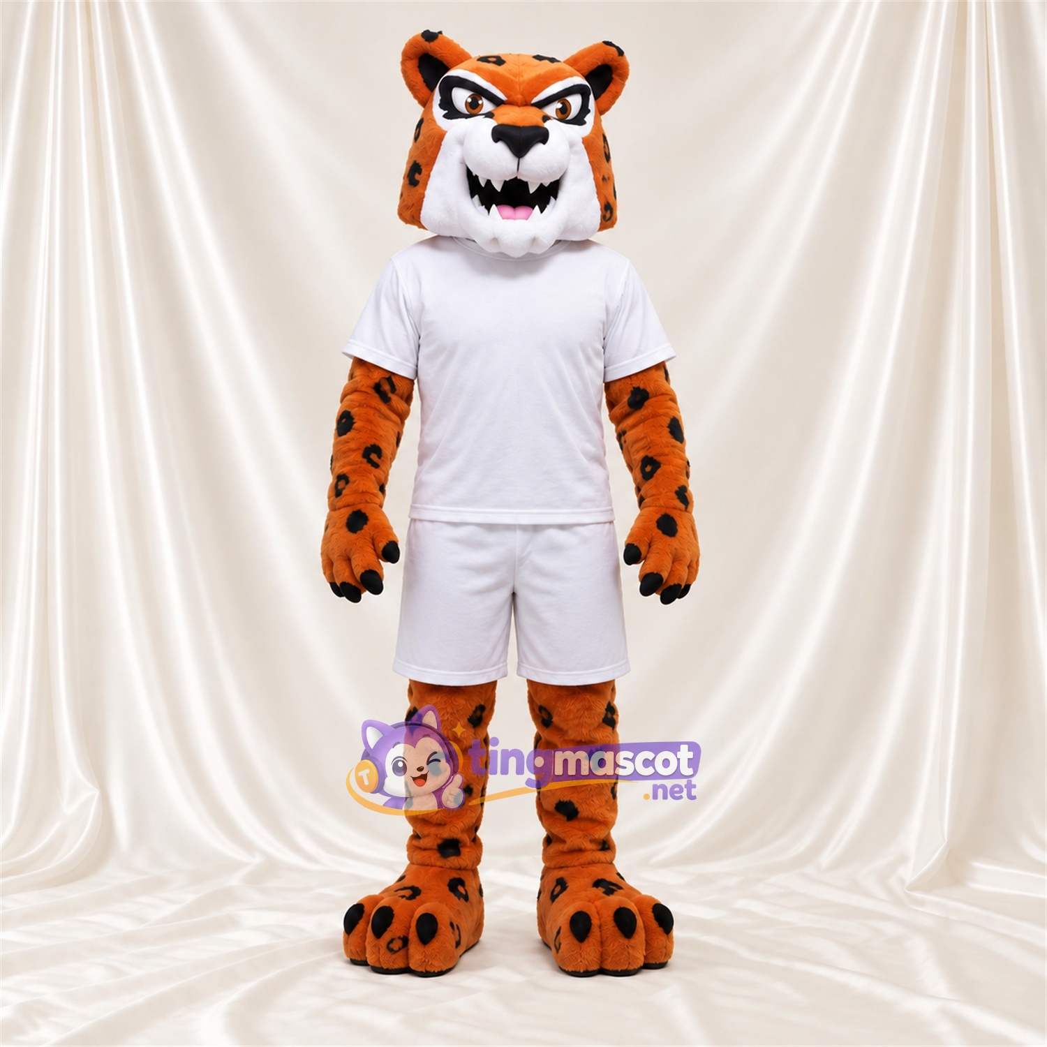 Maskottchenkostüm Gefleckte Katze – orange – Sporttrikot (weiß) Maskottchenkostüm Gefleckte Katze – orange – Sporttrikot (weiß)