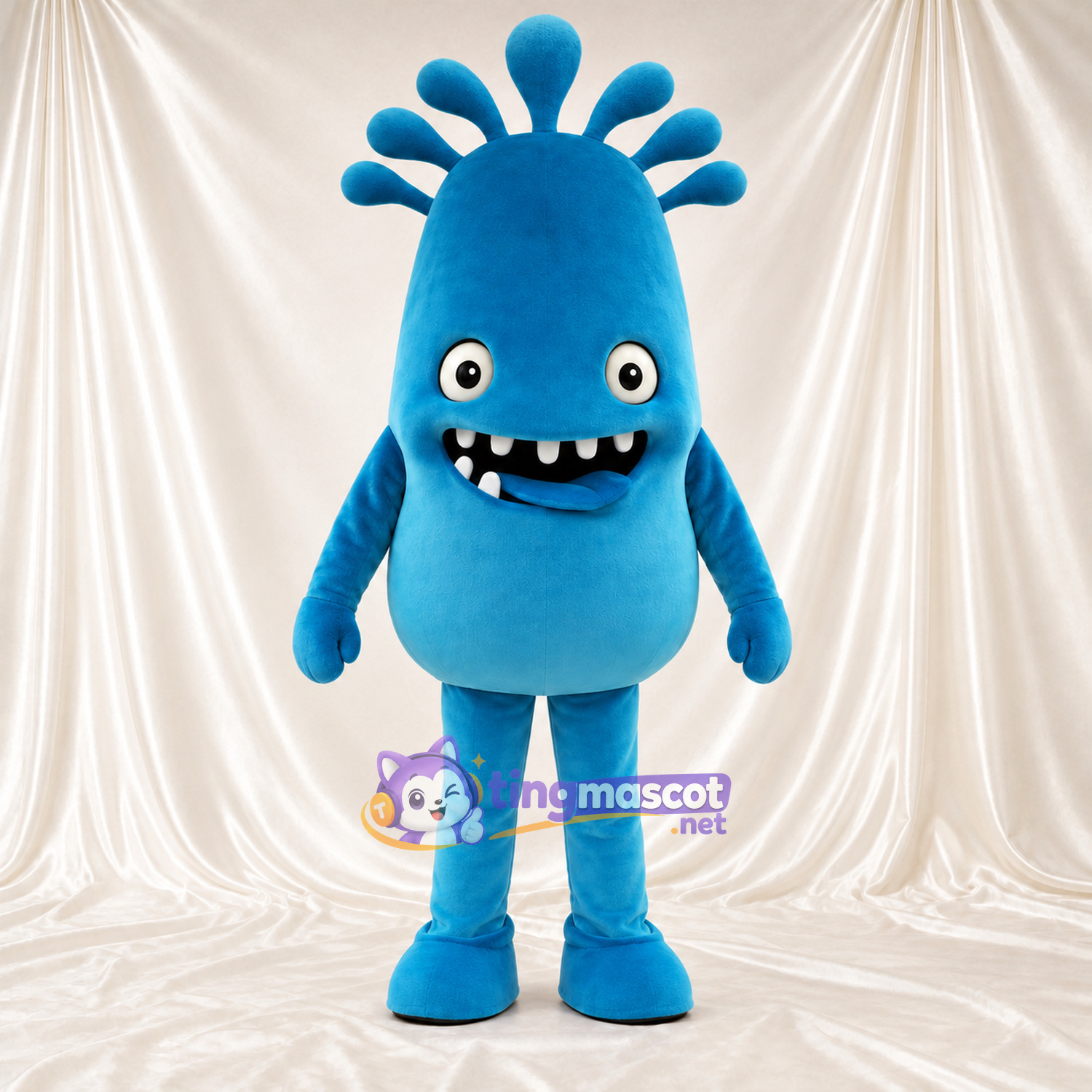 Blue Monster Mascot Costume - Head Tuft and Toothy Grin Blue Monster Mascot Costume - Head Tuft and Toothy Grin