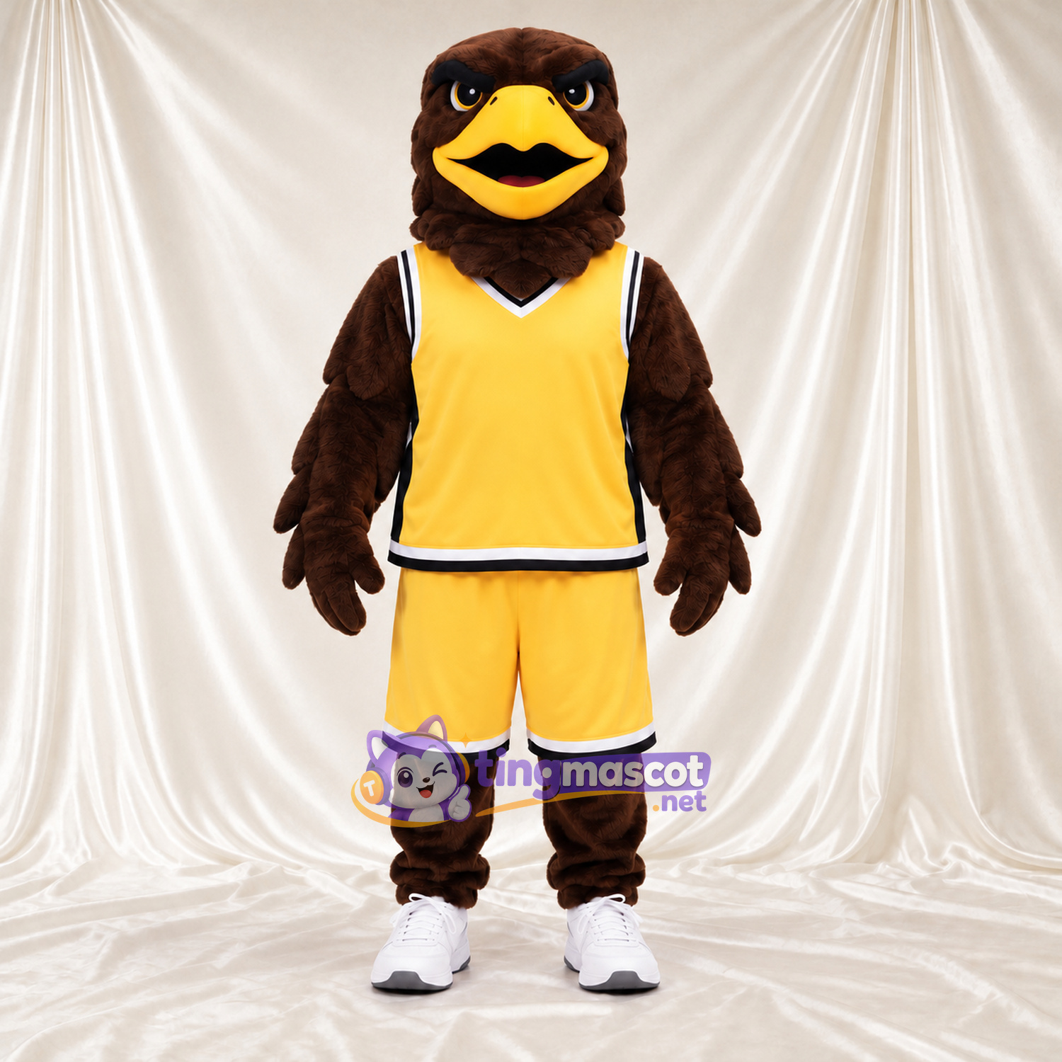 Maskottchenkostüm Adler – braun – Sporttrikot (gelb) Maskottchenkostüm Adler – braun – Sporttrikot (gelb)