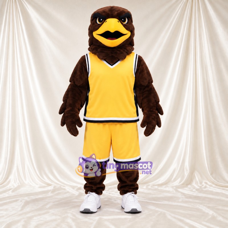 Costume de mascotte Aigle – marron – Tenue de sport (jaune) Costume de mascotte Aigle – marron – Tenue de sport (jaune)
