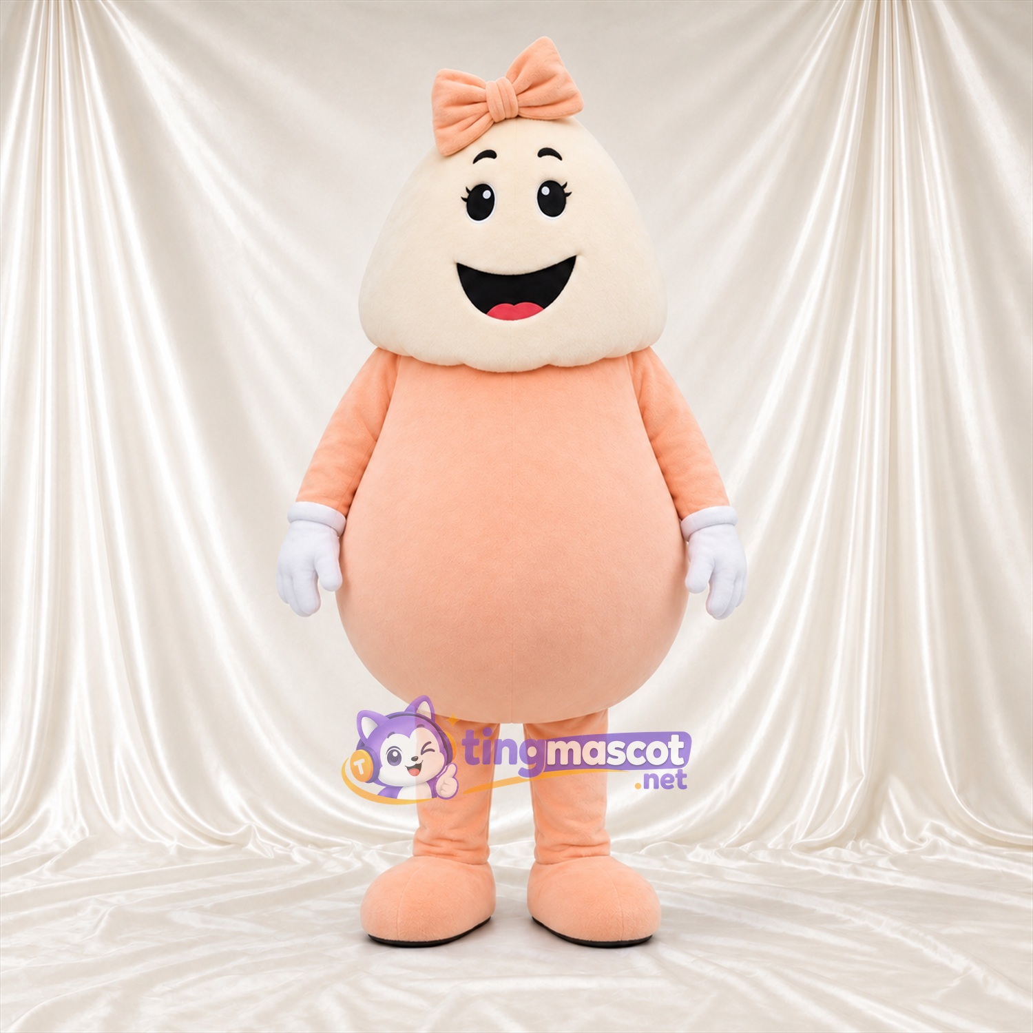 Maskottchenkostüm Dessertfigur – pfirsichfarben / creme – Schleife (pfirsichfarben); Handschuhe (weiß) Maskottchenkostüm Dessertfigur – pfirsichfarben / creme – Schleife (pfirsichfarben); Handschuhe (weiß)