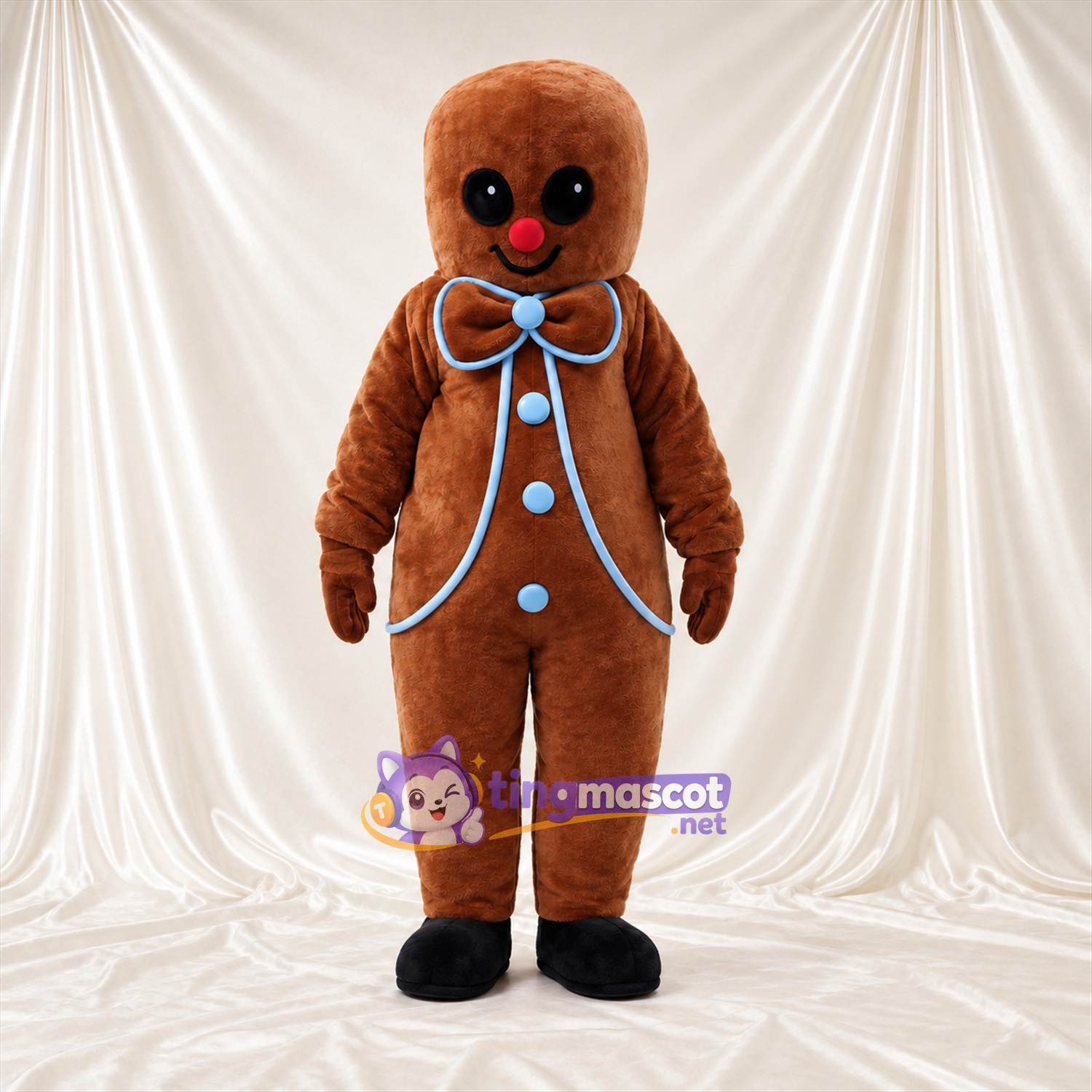 Brown Gingerbread Man Mascot Costume - Blue Bow Tie and Buttons Brown Gingerbread Man Mascot Costume - Blue Bow Tie and Buttons