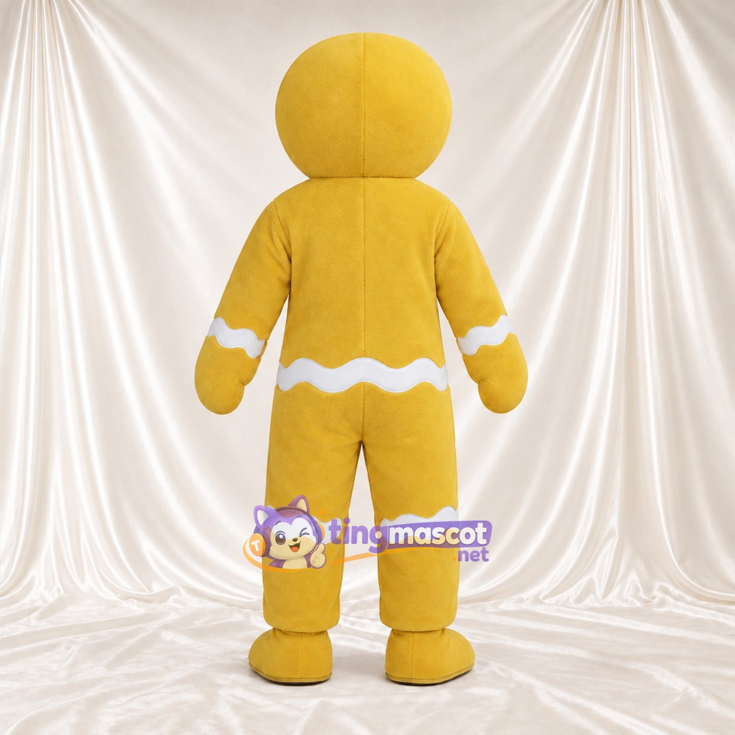 Costume de mascotte Bonhomme en pain d’épices – jaune – Boutons (violet) Costume de mascotte Bonhomme en pain d’épices – jaune – Boutons (violet)