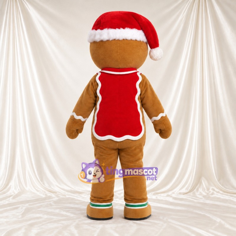 Costume de mascotte Bonhomme en pain d’épices – marron – Bonnet de Noël; Gilet (rouge) Costume de mascotte Bonhomme en pain d’épices – marron – Bonnet de Noël; Gilet (rouge)