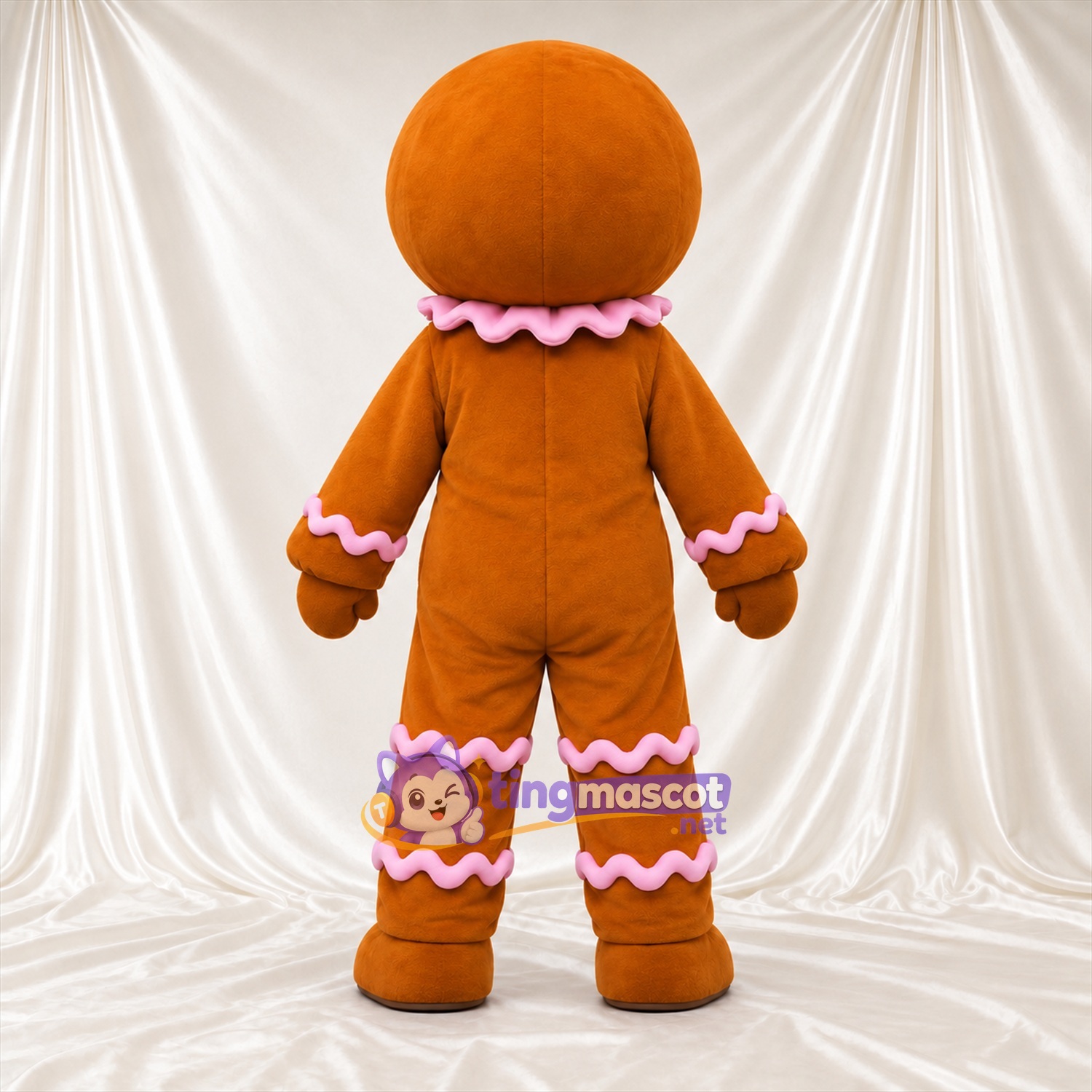Brown Gingerbread Man Mascot Costume - Peppermint Candy Buttons and Pink Icing Trim Brown Gingerbread Man Mascot Costume - Peppermint Candy Buttons and Pink Icing Trim