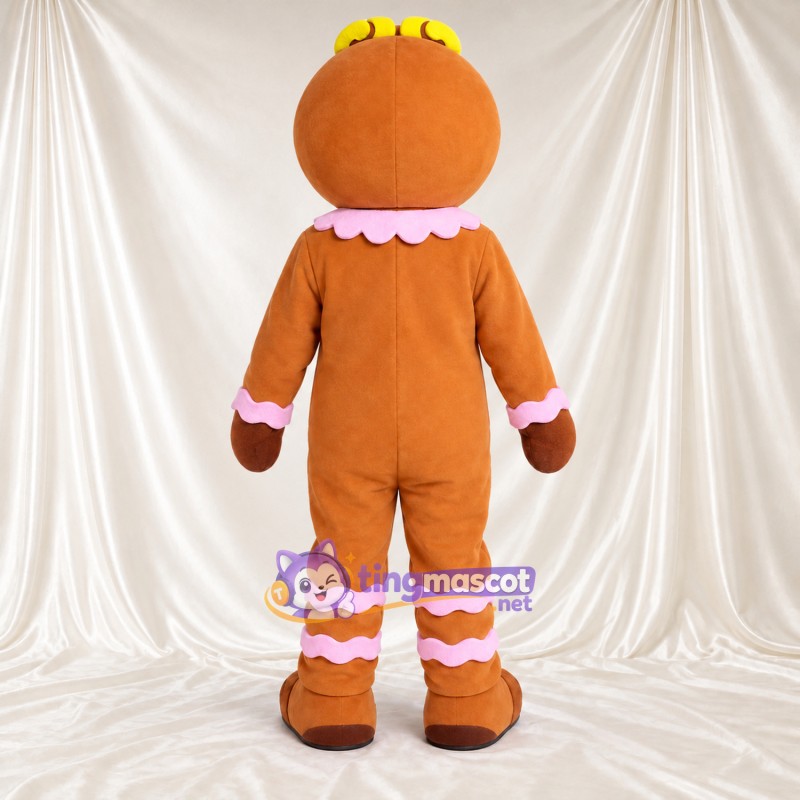 Brown Gingerbread Man Mascot Costume - Peppermint Candy Buttons and Yellow Forehead Swirls Brown Gingerbread Man Mascot Costume - Peppermint Candy Buttons and Yellow Forehead Swirls