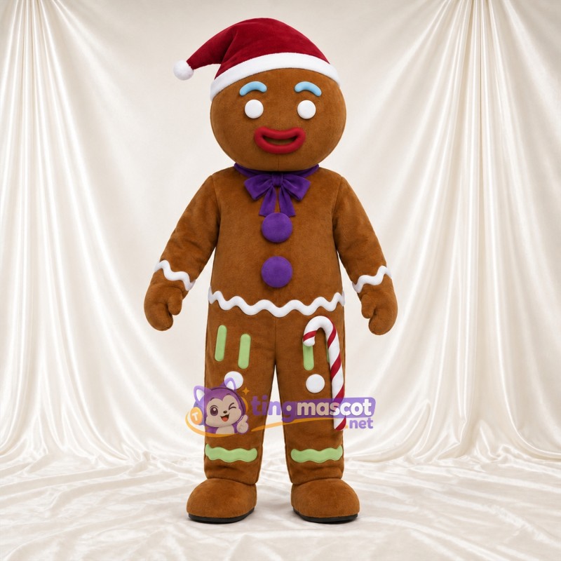 Costume de mascotte Bonhomme en pain d’épices – marron – Bonnet de Noël; Nœud (violet) Costume de mascotte Bonhomme en pain d’épices – marron – Bonnet de Noël; Nœud (violet)