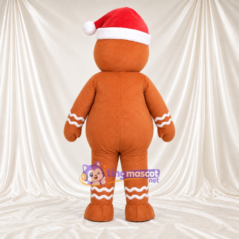 Costume de mascotte Bonhomme en pain d’épices – marron – Bonnet de Noël; Boutons (vert) Costume de mascotte Bonhomme en pain d’épices – marron – Bonnet de Noël; Boutons (vert)
