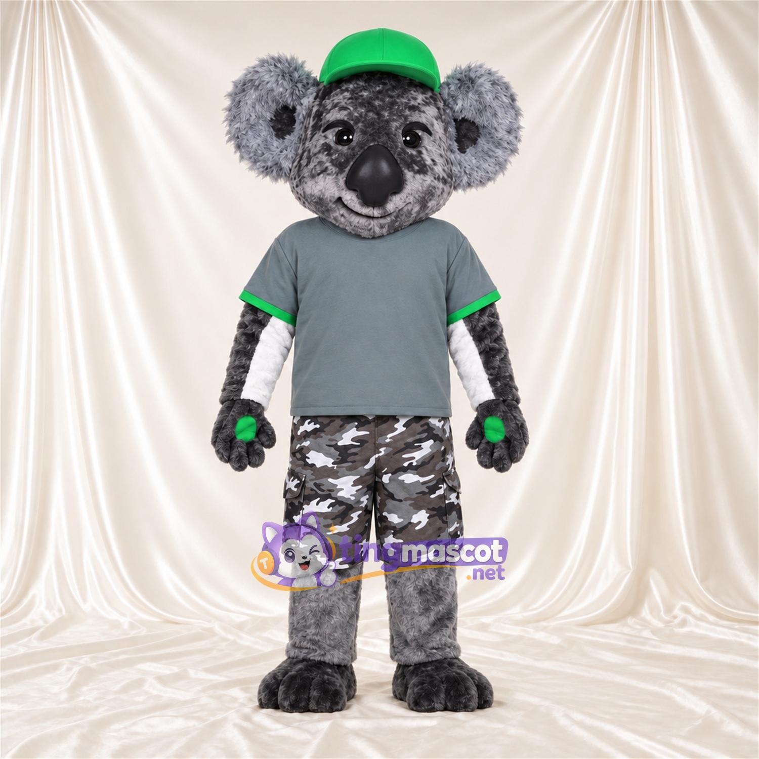 Costume de mascotte Koala – gris – Casquette (vert); Chemise (gris) Costume de mascotte Koala – gris – Casquette (vert); Chemise (gris)