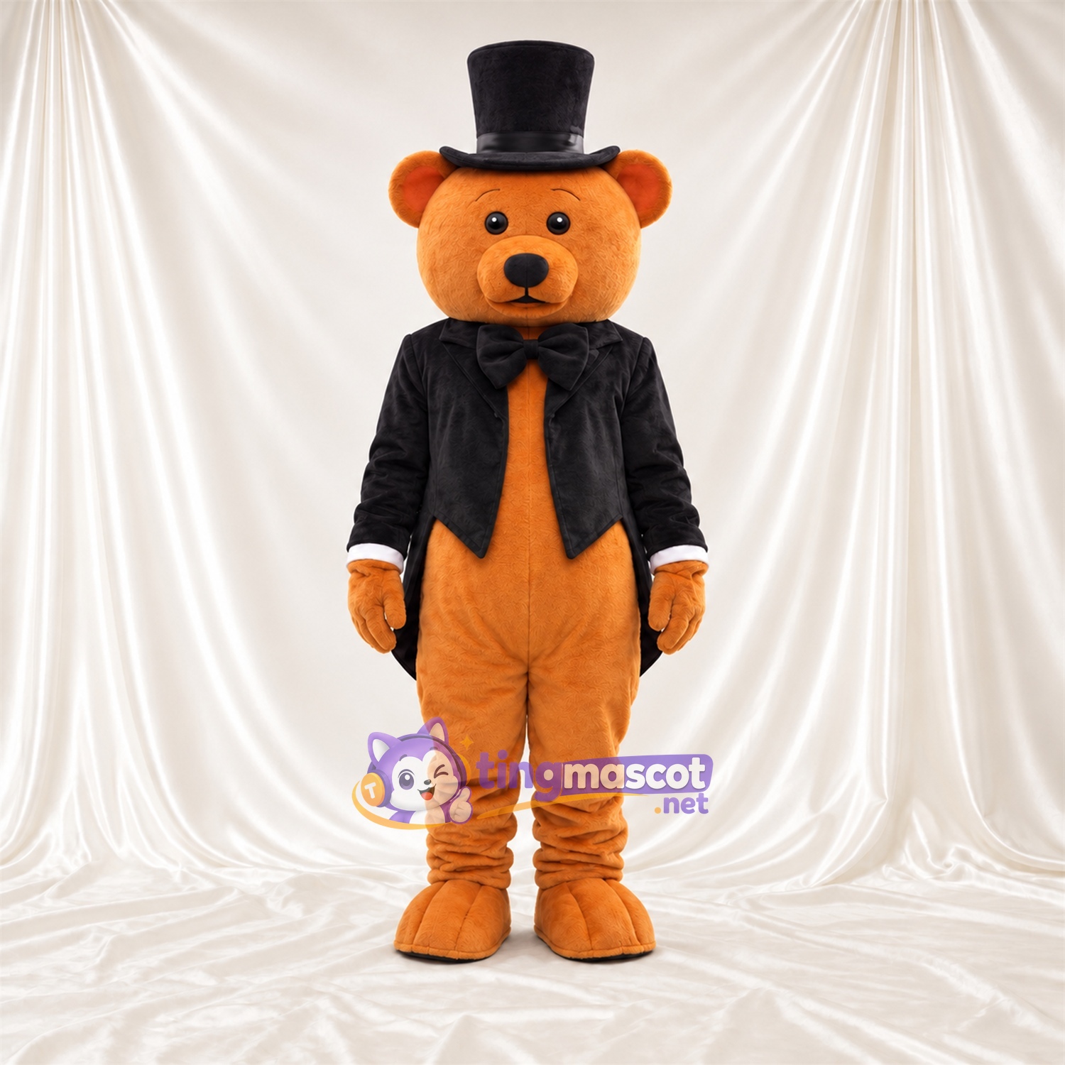 Maskottchenkostüm Bär – orange – Jacke (schwarz); Zylinder Maskottchenkostüm Bär – orange – Jacke (schwarz); Zylinder