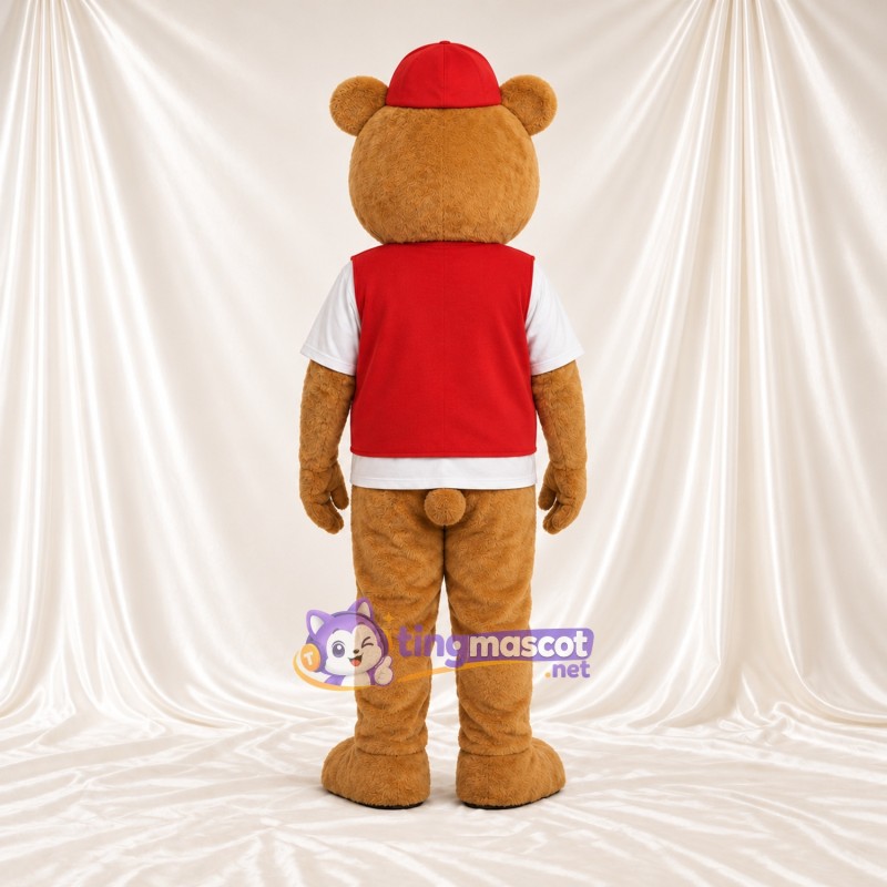 Maskottchenkostüm Bär – hellbraun – Kappe (rot); Weste Maskottchenkostüm Bär – hellbraun – Kappe (rot); Weste
