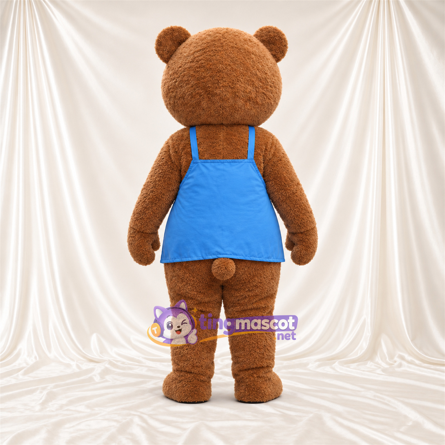 Maskottchenkostüm Bär – braun – Schürze (blau) Maskottchenkostüm Bär – braun – Schürze (blau)