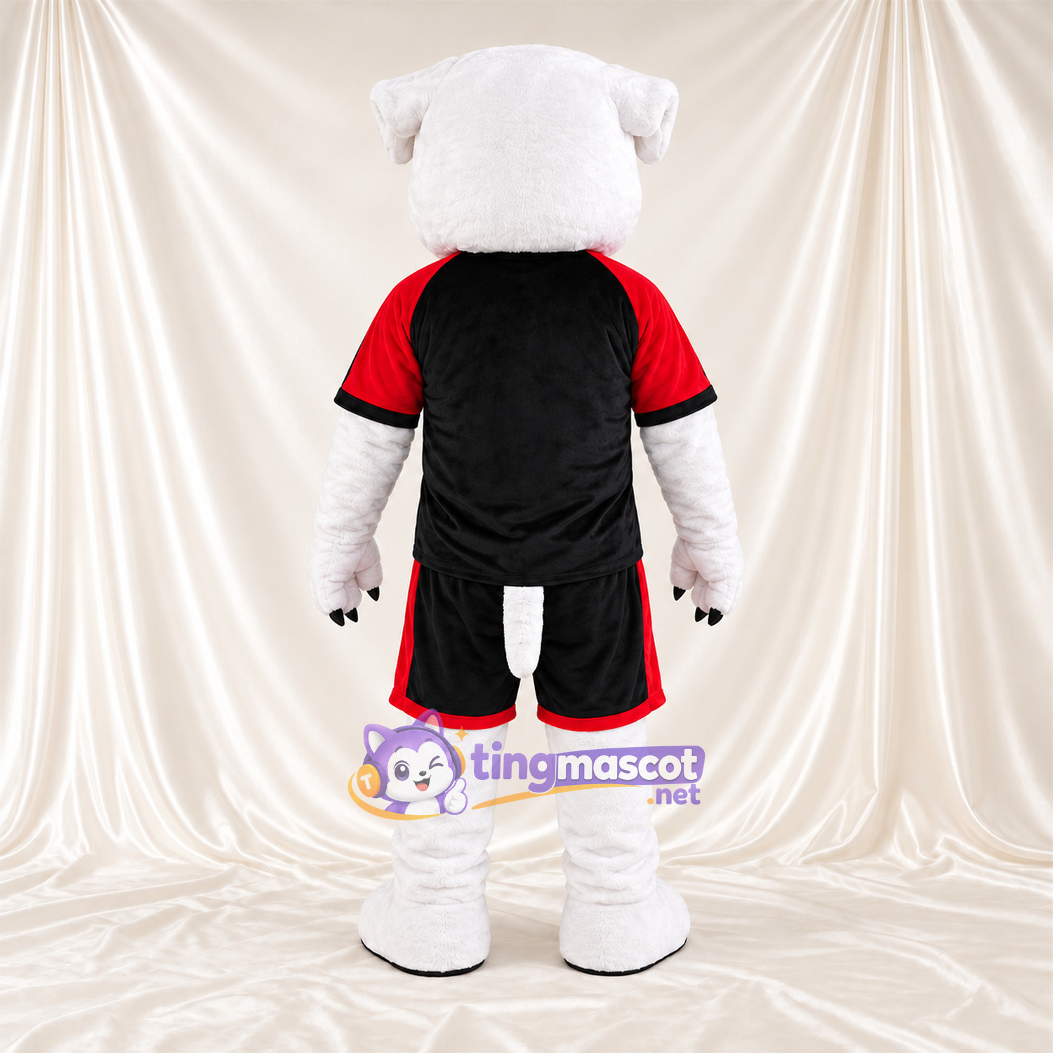 Costume de mascotte Bouledogue – blanc – Tenue de sport (noir / rouge) Costume de mascotte Bouledogue – blanc – Tenue de sport (noir / rouge)