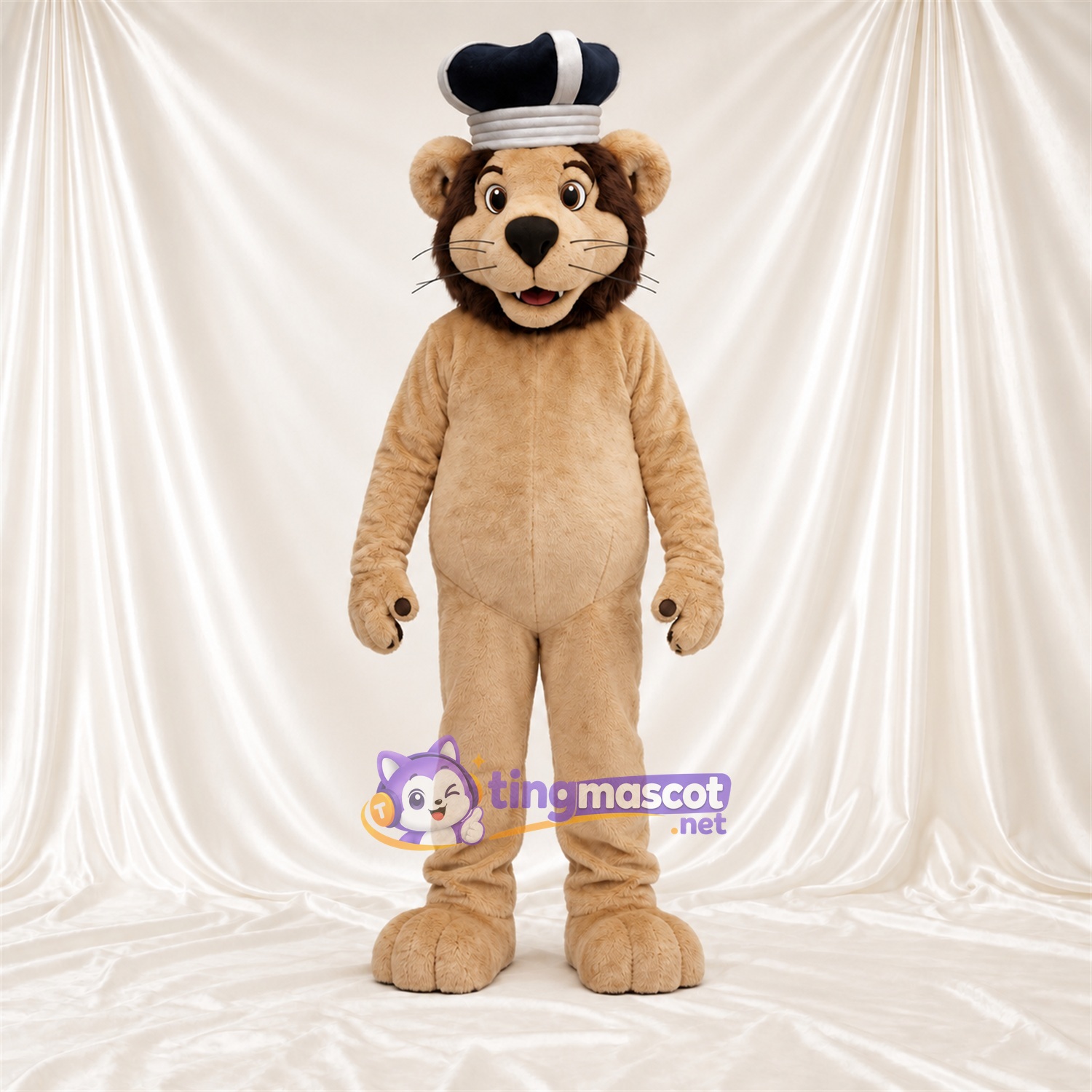 Costume de mascotte Lion – brun clair – Chapeau (noir / blanc) Costume de mascotte Lion – brun clair – Chapeau (noir / blanc)