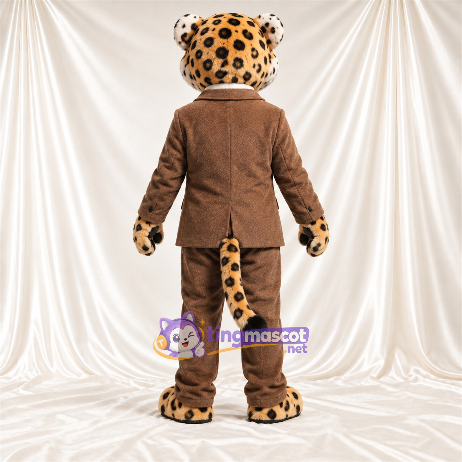 Maskottchenkostüm Leopard – hellbraun / schwarz – Anzug (braun); Krawatte (gelb) Maskottchenkostüm Leopard – hellbraun / schwarz – Anzug (braun); Krawatte (gelb)