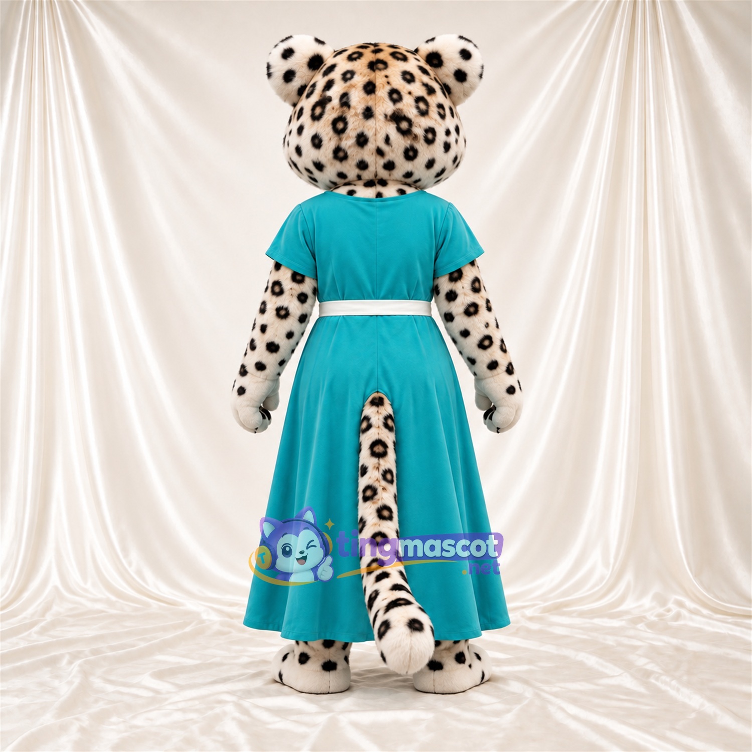 Maskottchenkostüm Gepard – creme / schwarz – Kleid (türkis) Maskottchenkostüm Gepard – creme / schwarz – Kleid (türkis)