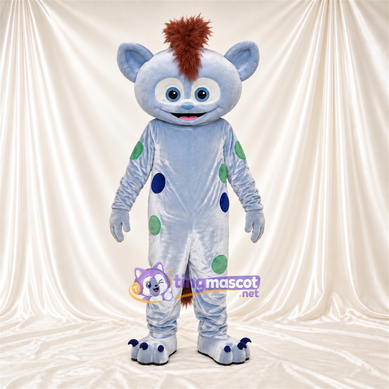 Costume de mascotte Monstre – bleu clair – Crête iroquoise (marron); Taches (vert / bleu) Costume de mascotte Monstre – bleu clair – Crête iroquoise (marron); Taches (vert / bleu)