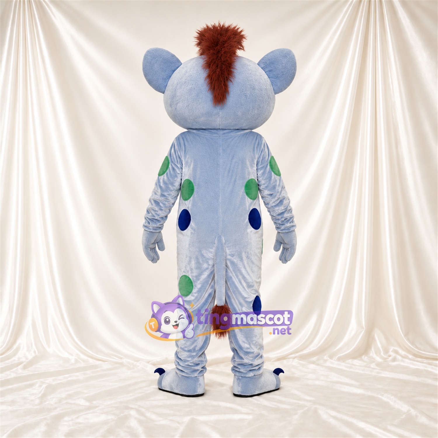 Costume de mascotte Monstre – bleu clair – Crête iroquoise (marron); Taches (vert / bleu) Costume de mascotte Monstre – bleu clair – Crête iroquoise (marron); Taches (vert / bleu)
