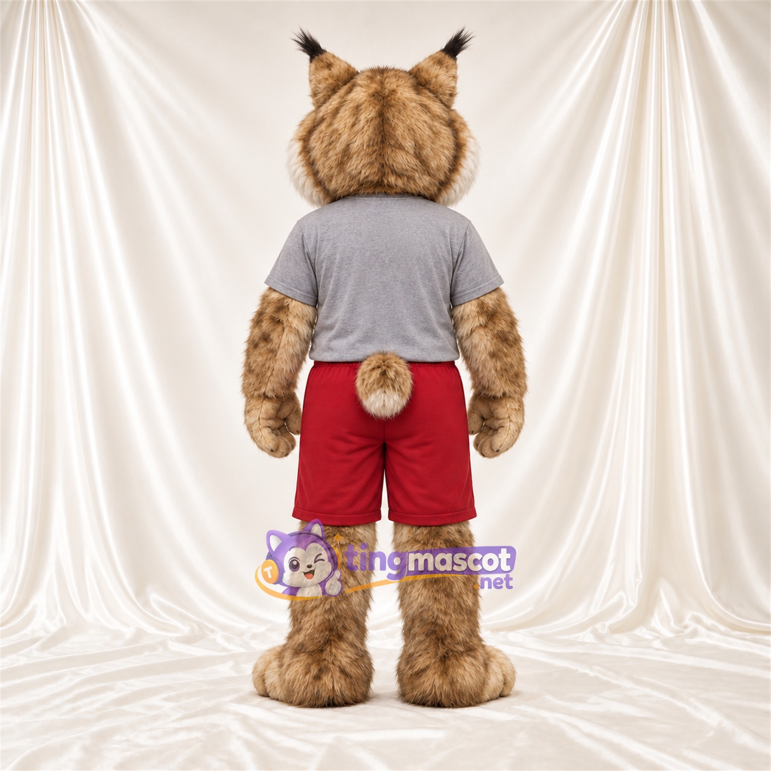 Costume de mascotte Lynx – brun clair – Chemise (gris); Short (rouge) Costume de mascotte Lynx – brun clair – Chemise (gris); Short (rouge)