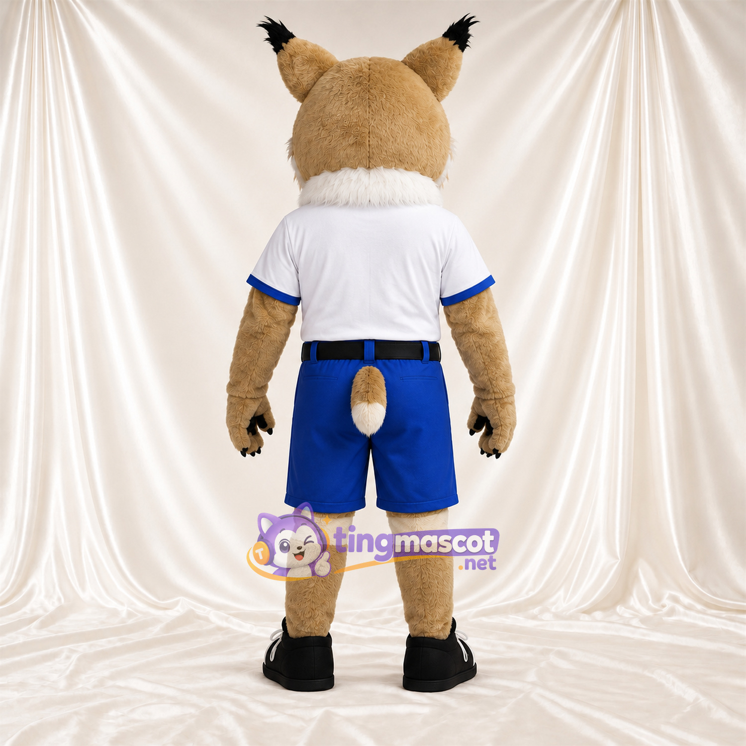 Costume de mascotte Lynx – brun clair – Chemise (blanc); Short (bleu) Costume de mascotte Lynx – brun clair – Chemise (blanc); Short (bleu)