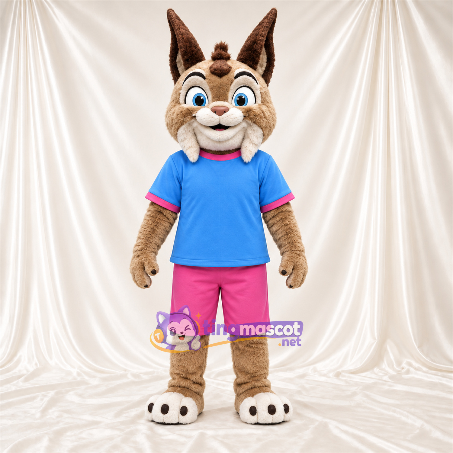 Costume de mascotte Lynx – brun clair – Chemise (bleu); Short (rose) Costume de mascotte Lynx – brun clair – Chemise (bleu); Short (rose)