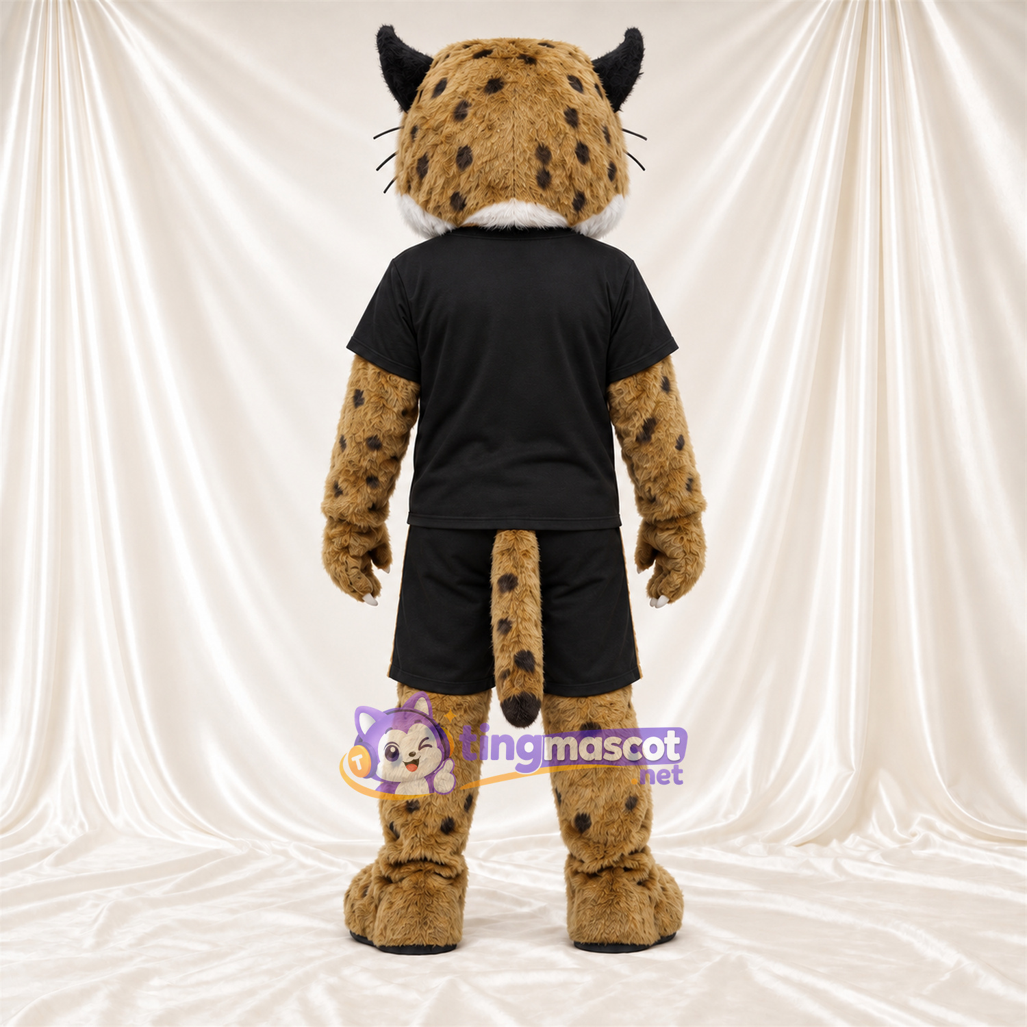 Tan and Black Bobcat Mascot Costume - Black Sports Uniform Tan and Black Bobcat Mascot Costume - Black Sports Uniform