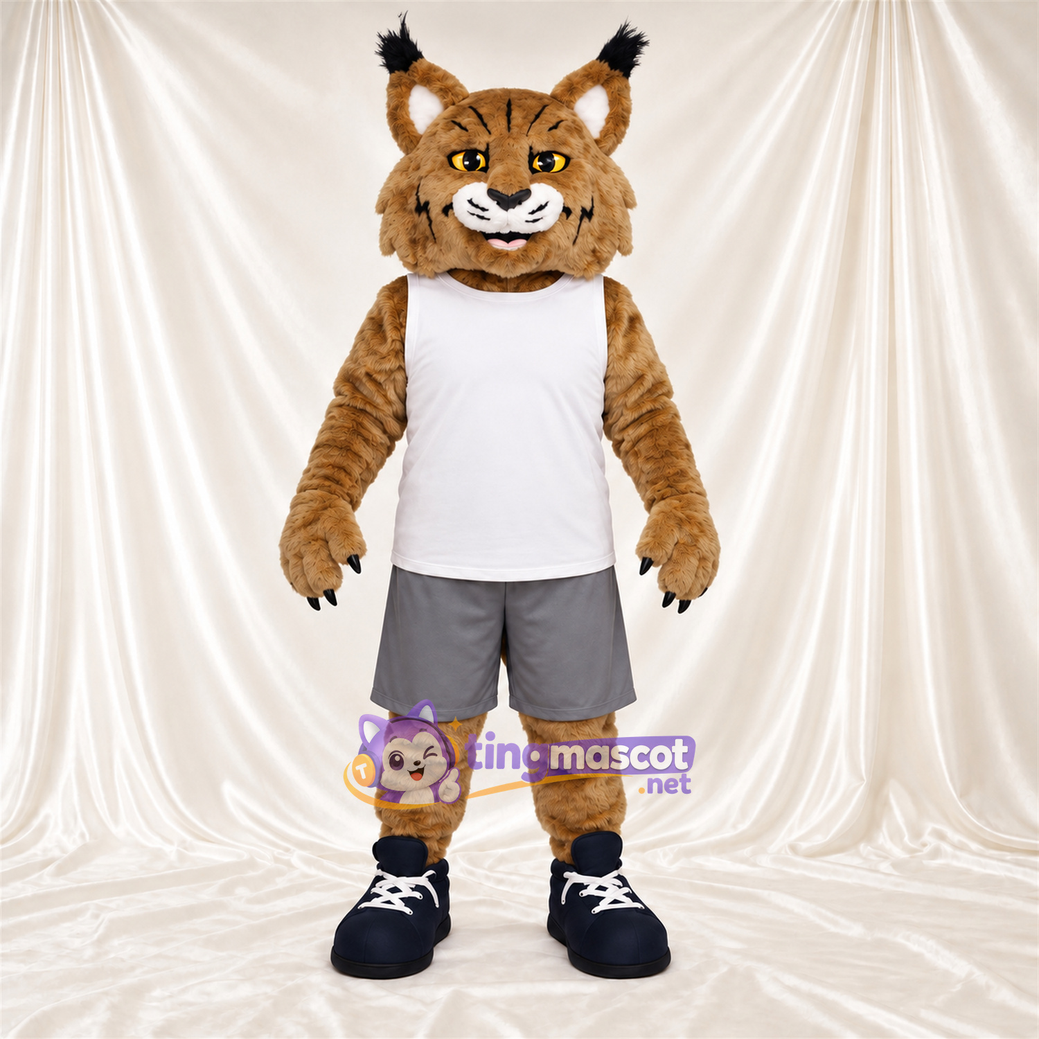 Costume de mascotte Lynx roux – brun clair – Débardeur (blanc); Short (gris) Costume de mascotte Lynx roux – brun clair – Débardeur (blanc); Short (gris)
