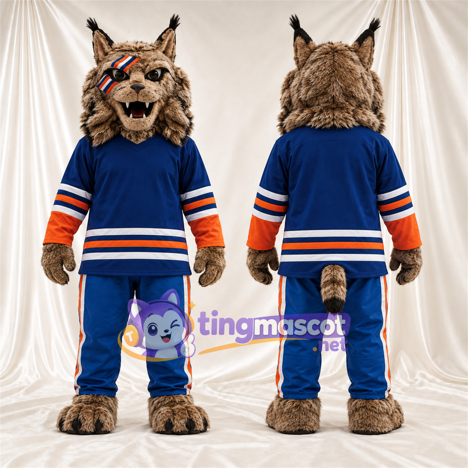 Costume de mascotte Chat sauvage – brun clair – Maillot; Pantalon (bleu) Costume de mascotte Chat sauvage – brun clair – Maillot; Pantalon (bleu)