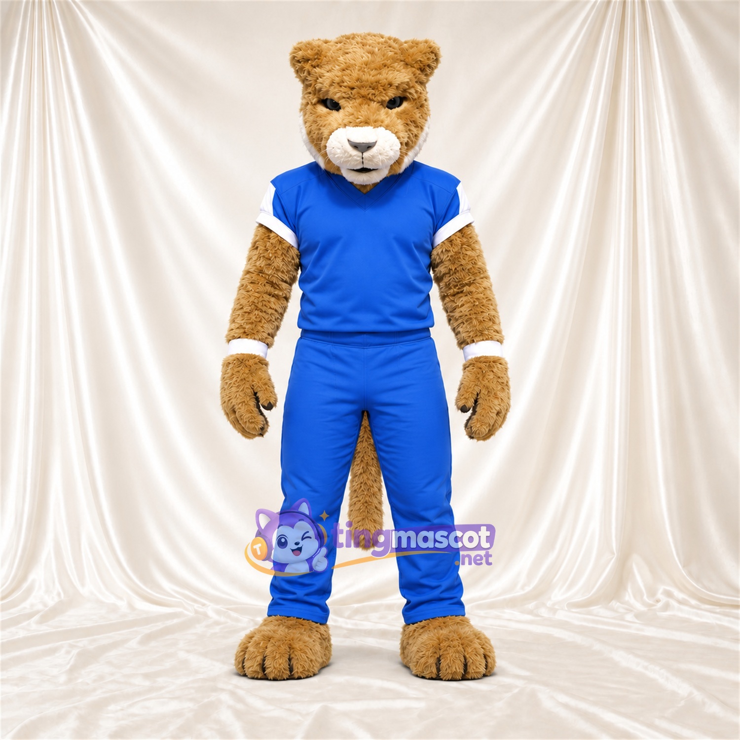 Costume de mascotte Chat – brun clair – Tenue de sport (bleu) Costume de mascotte Chat – brun clair – Tenue de sport (bleu)