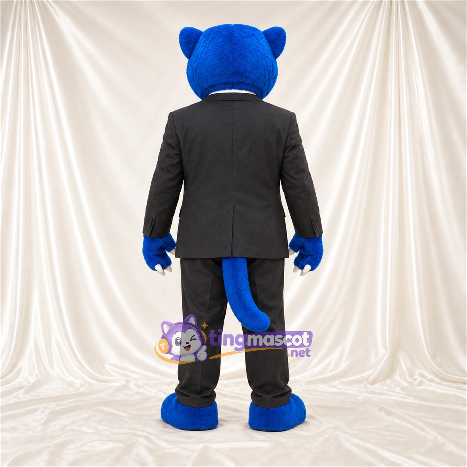 Costume de mascotte Chat sauvage – bleu – Costume (noir); Cravate (doré) Costume de mascotte Chat sauvage – bleu – Costume (noir); Cravate (doré)