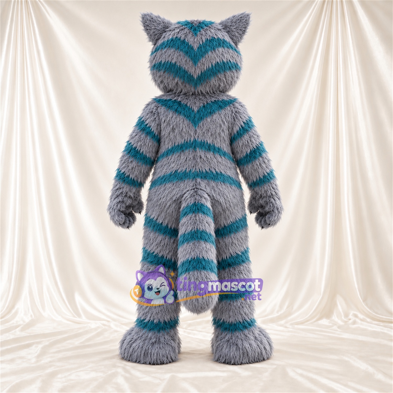 Costume de mascotte Chat du Cheshire – gris / bleu canard – Fourrure; Queue enroulée Costume de mascotte Chat du Cheshire – gris / bleu canard – Fourrure; Queue enroulée