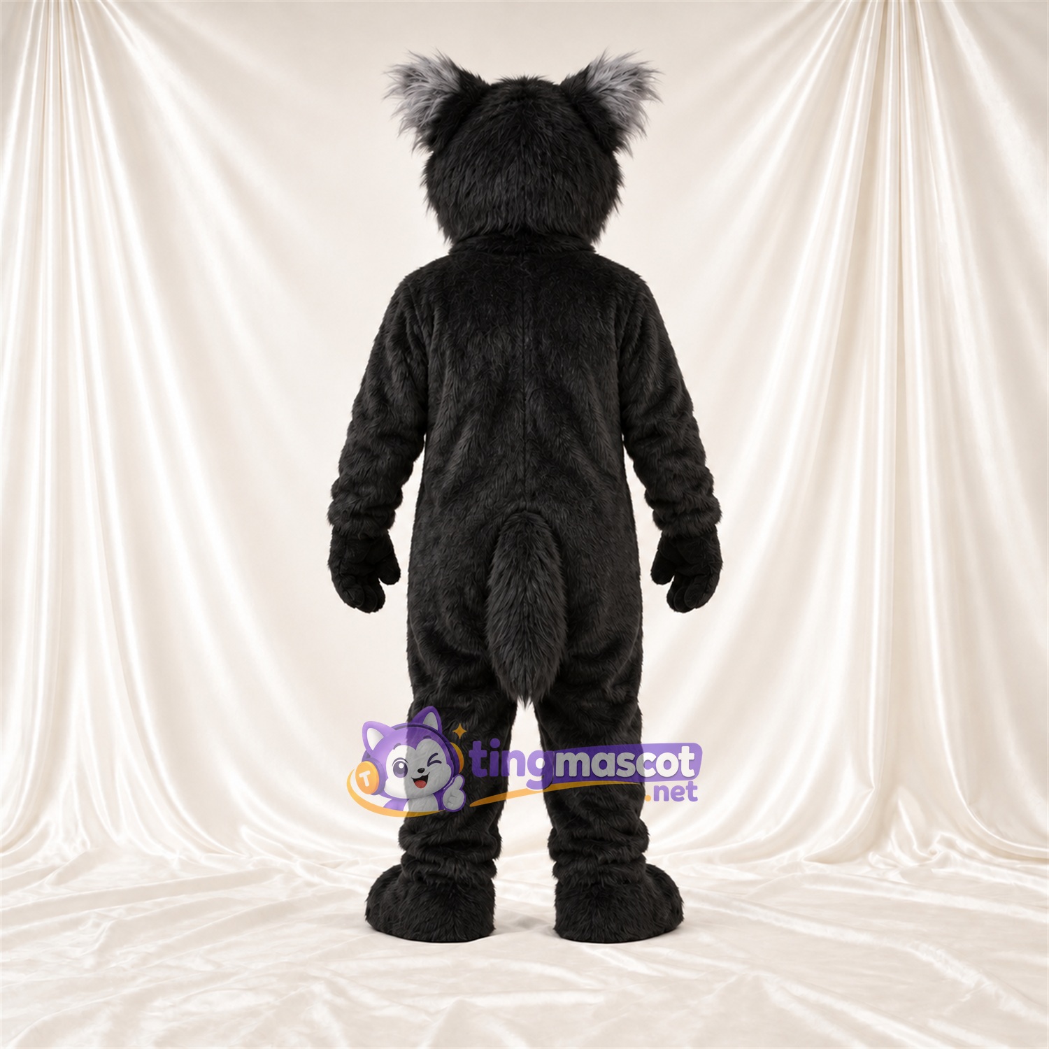 Black and White Wolf Mascot Costume - Pointed Fangs and Shaggy Fur Black and White Wolf Mascot Costume - Pointed Fangs and Shaggy Fur