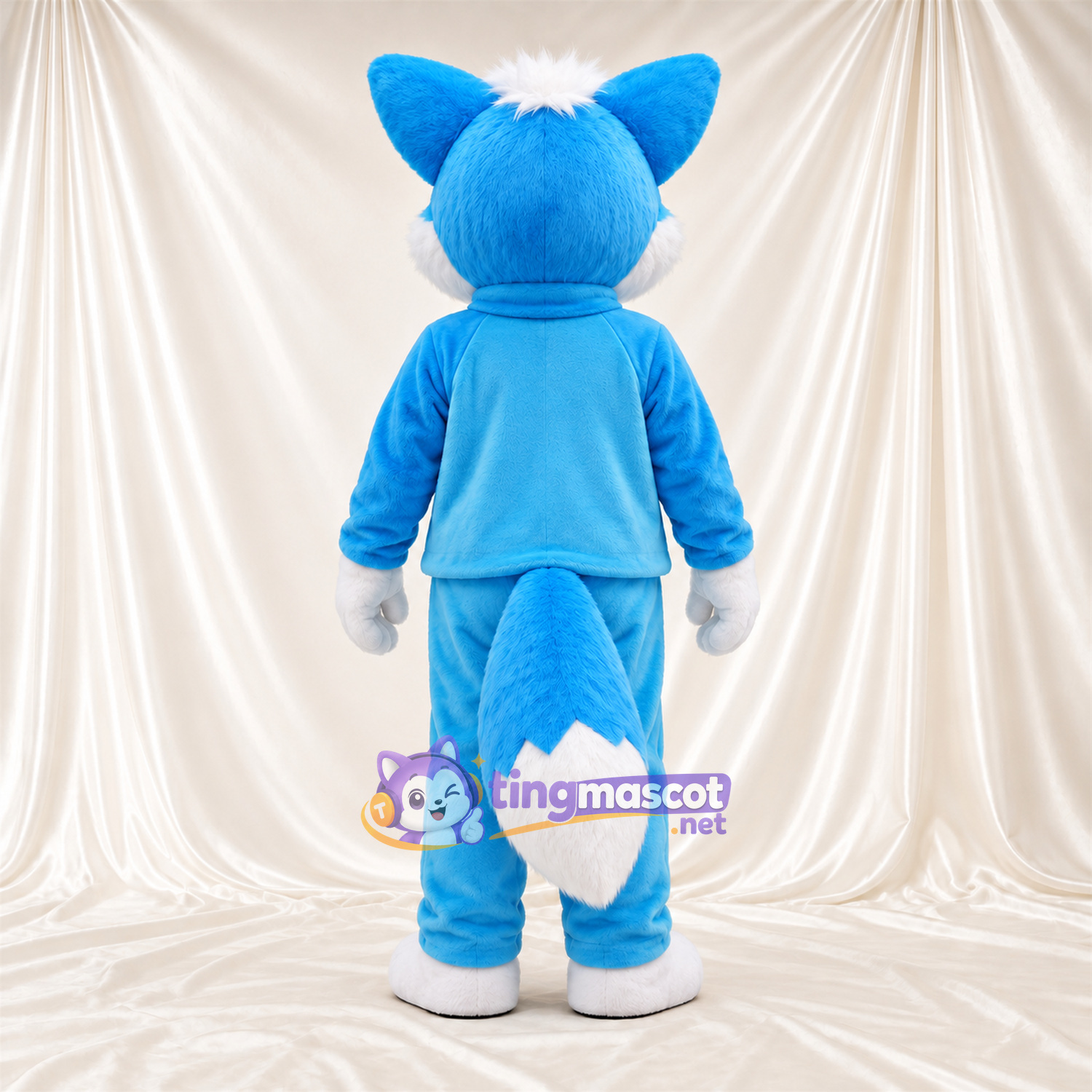 Blue and White Fox Mascot Costume - Blue Tracksuit Blue and White Fox Mascot Costume - Blue Tracksuit