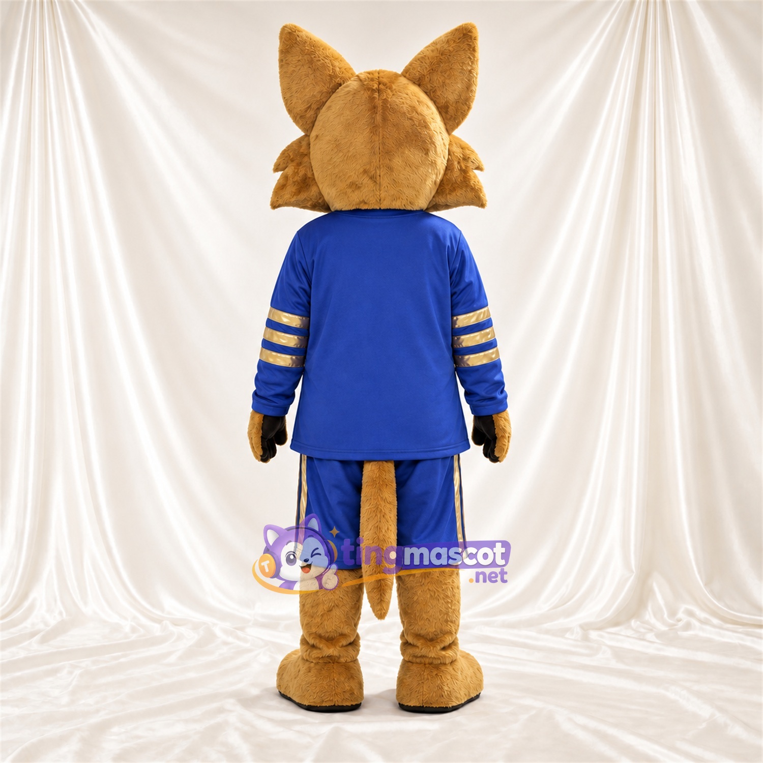 Costume de mascotte Coyote – brun clair – Tenue de sport (bleu) Costume de mascotte Coyote – brun clair – Tenue de sport (bleu)