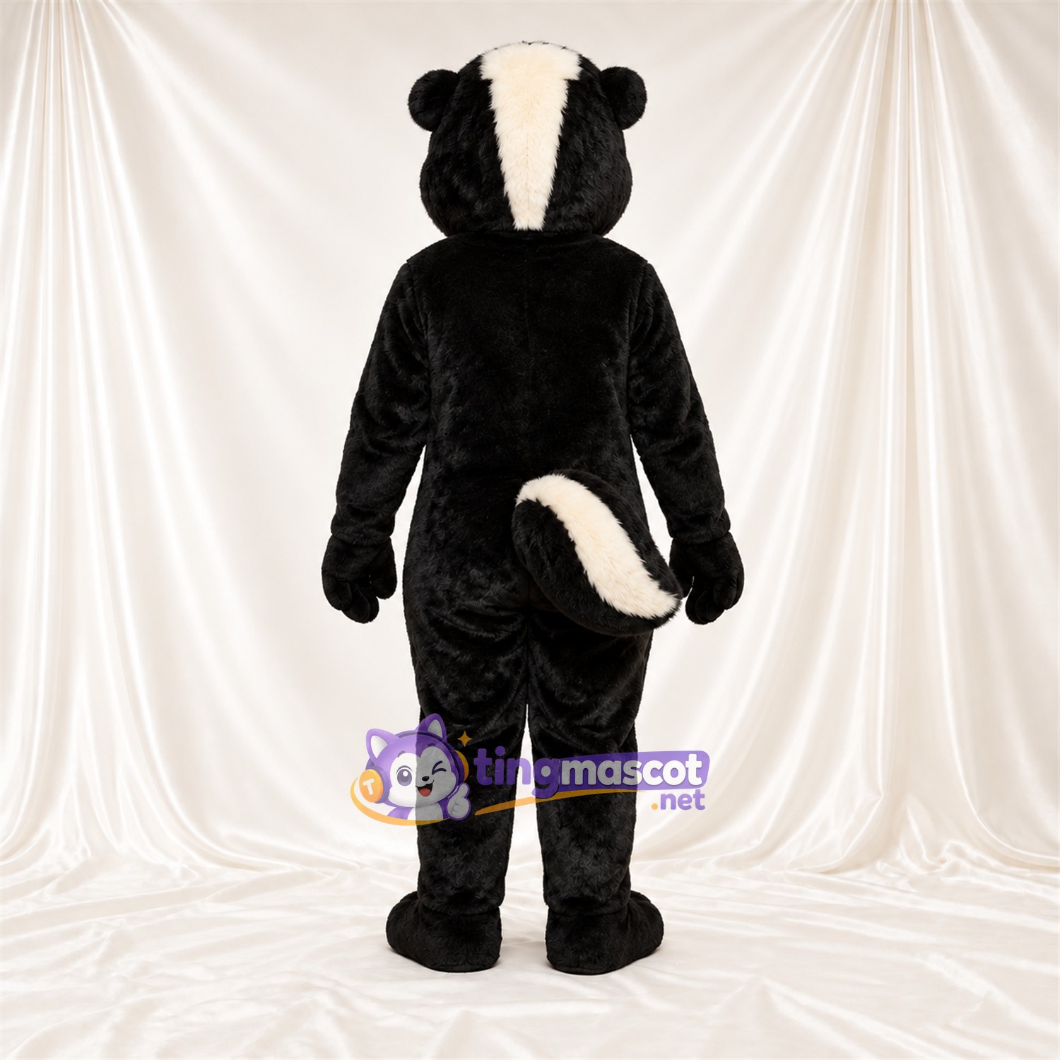 Costume de mascotte Mouffette – noir / blanc – Queue rayée (blanc); Yeux (bleu) Costume de mascotte Mouffette – noir / blanc – Queue rayée (blanc); Yeux (bleu)