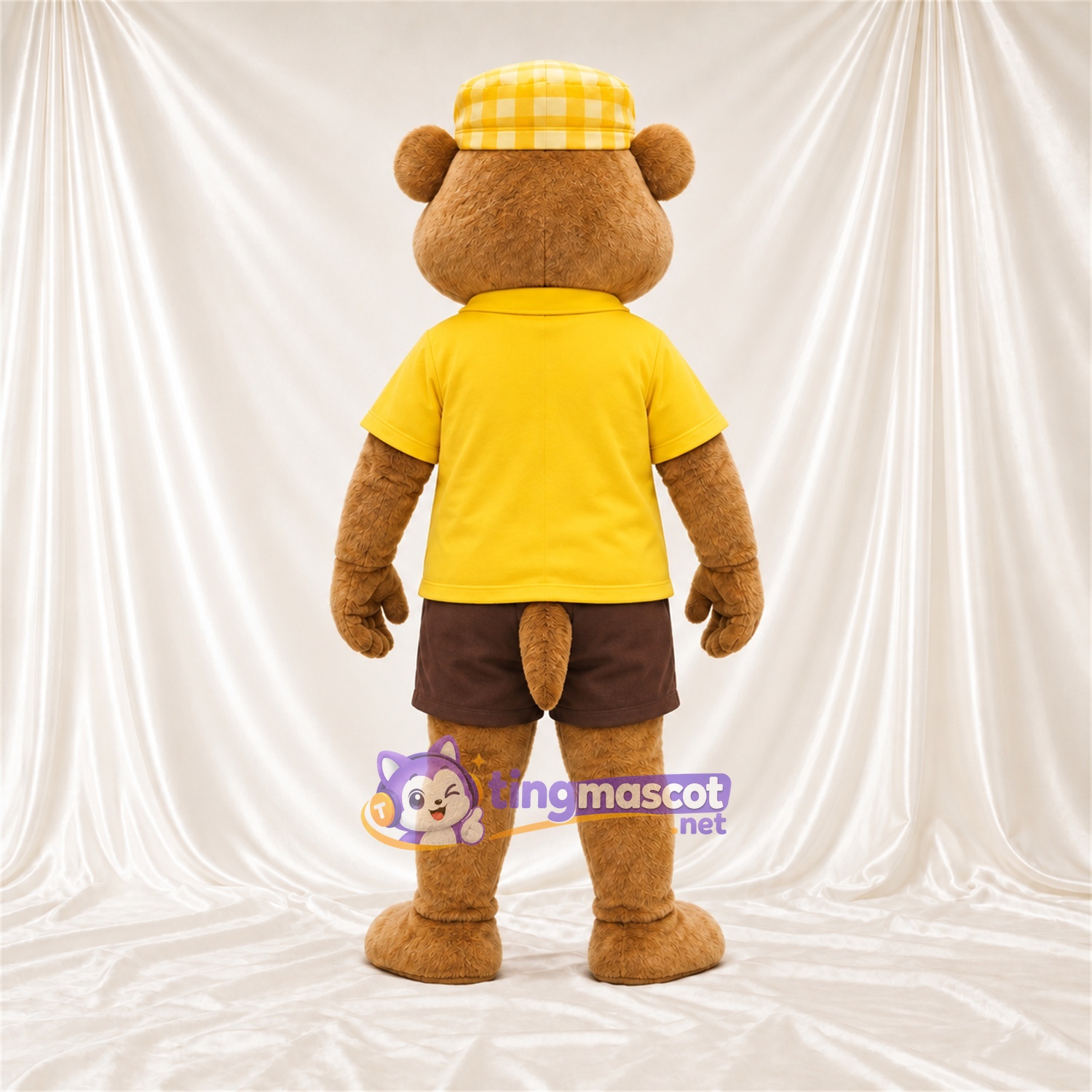 Maskottchenkostüm Otter – braun – Poloshirt (gelb); Shorts (braun) Maskottchenkostüm Otter – braun – Poloshirt (gelb); Shorts (braun)