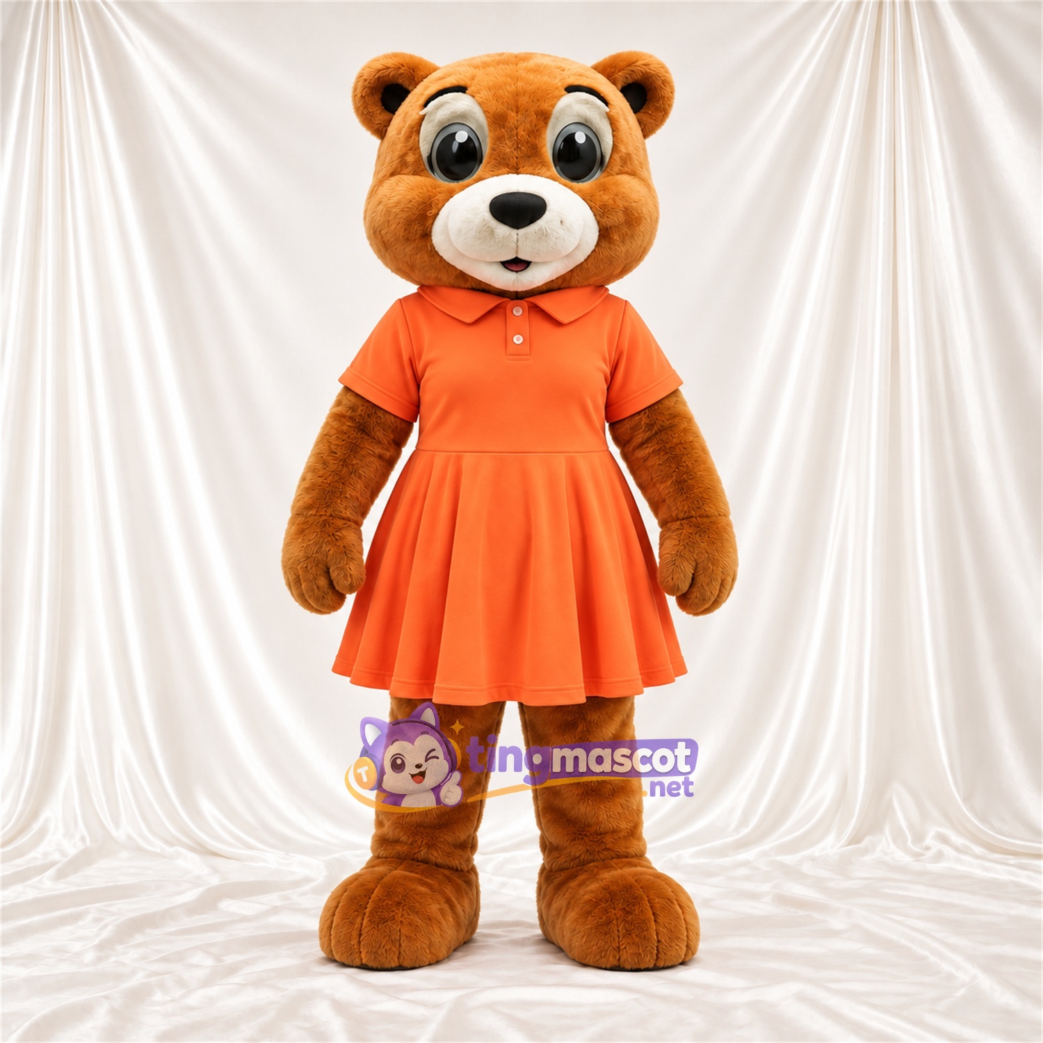 Maskottchenkostüm Bär – braun – Kleid (orange) Maskottchenkostüm Bär – braun – Kleid (orange)